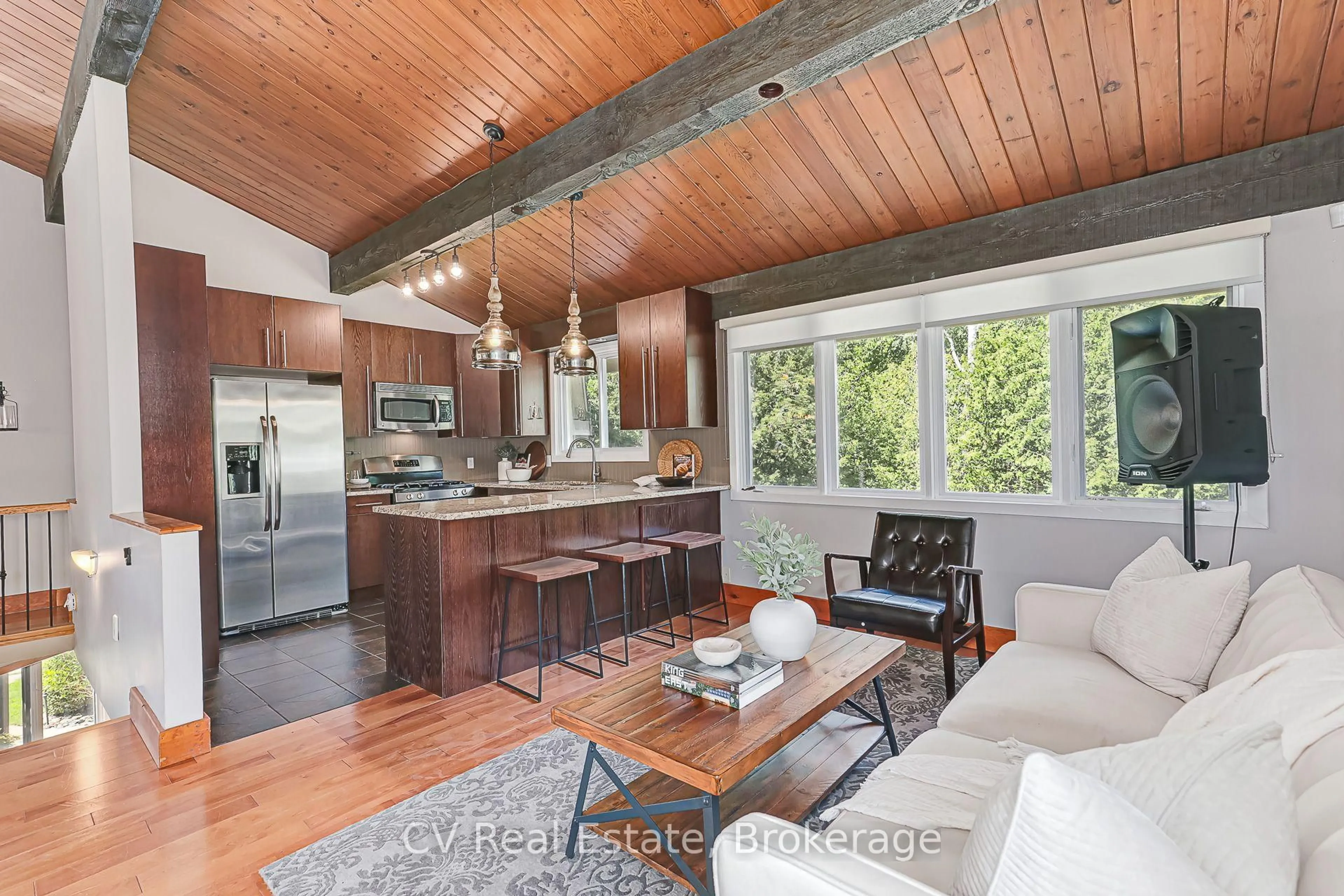 Open concept kitchen, wood/laminate floor for 156 Chamonix Cres, Blue Mountains Ontario L9Y 0S7