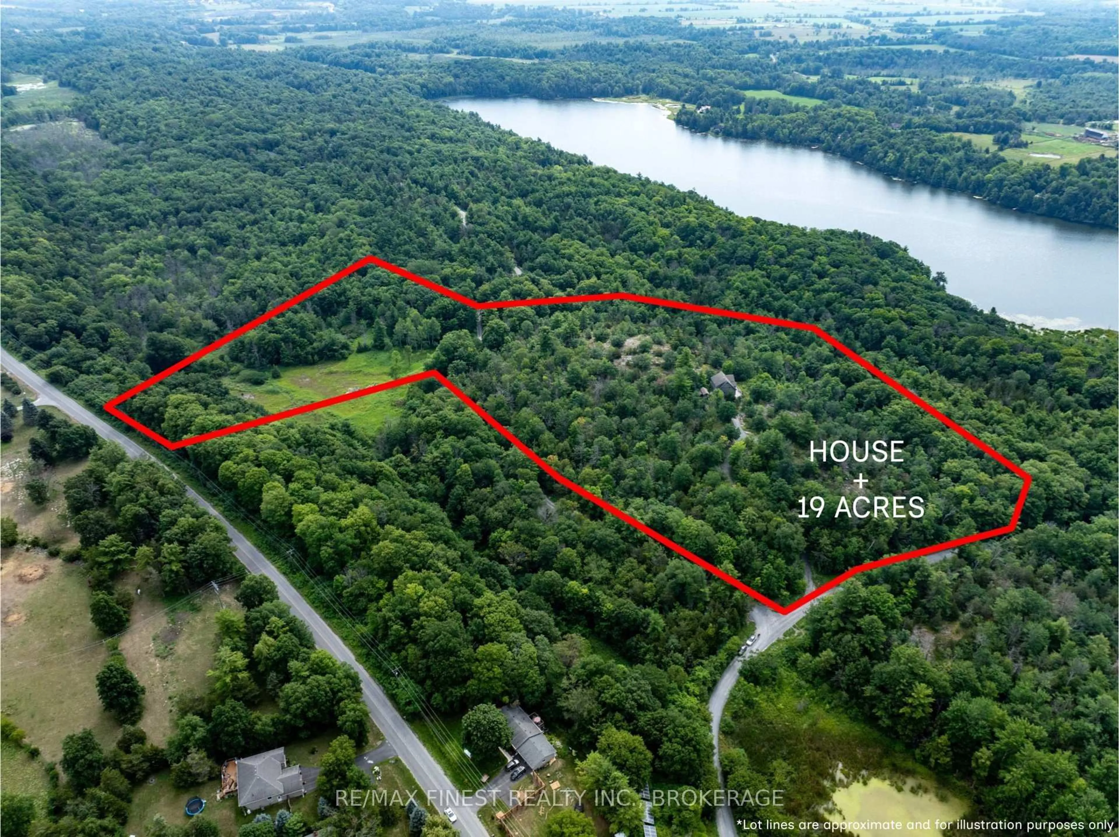 A pic from outside/outdoor area/front of a property/back of a property/a pic from drone, forest/trees view for 1035 Sweetfern Lane, Inverary Ontario K0H 1X0
