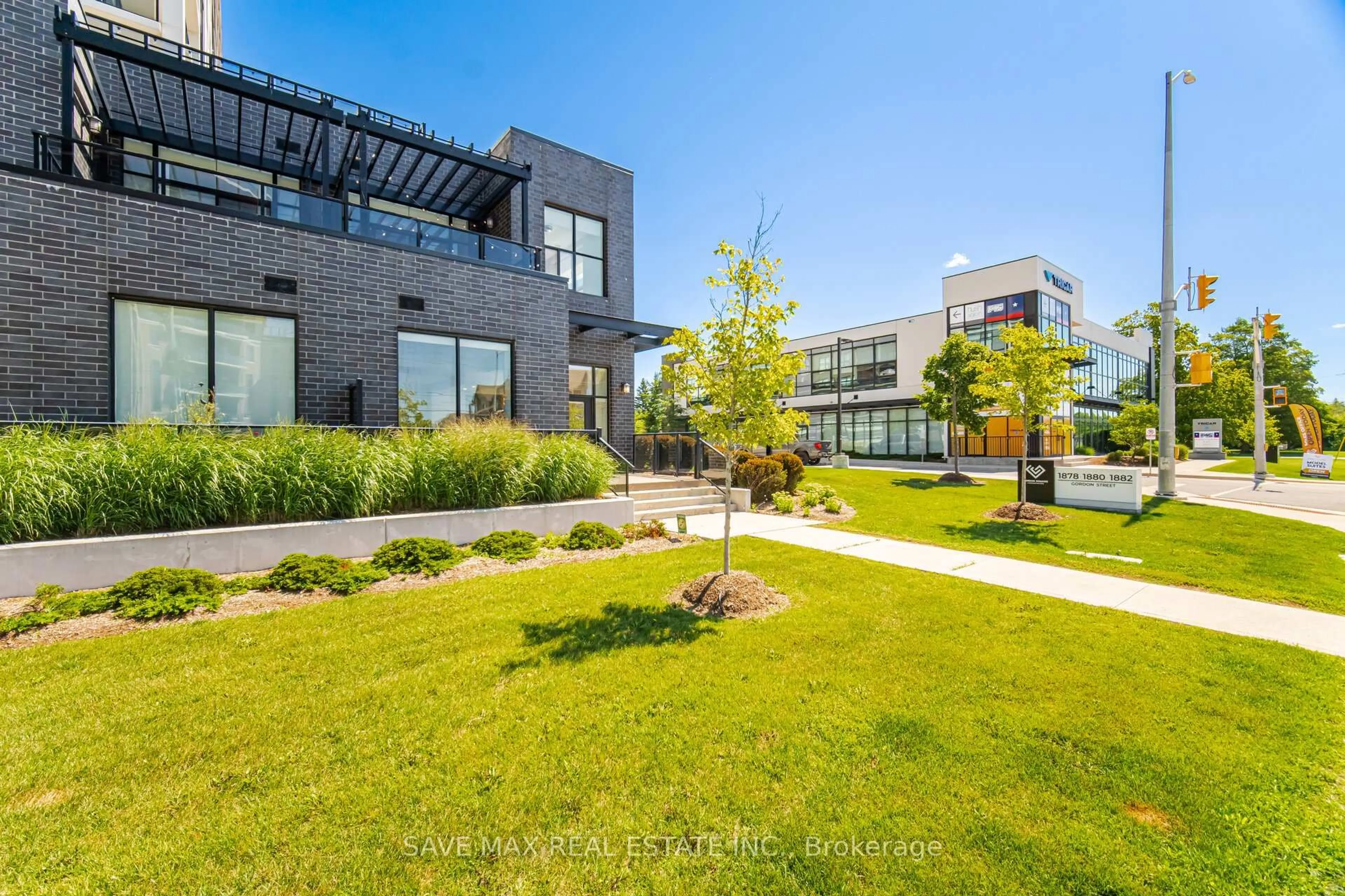A pic from outside/outdoor area/front of a property/back of a property/a pic from drone, unknown for 1878 Gordon St #103, Guelph Ontario N1L 0P4
