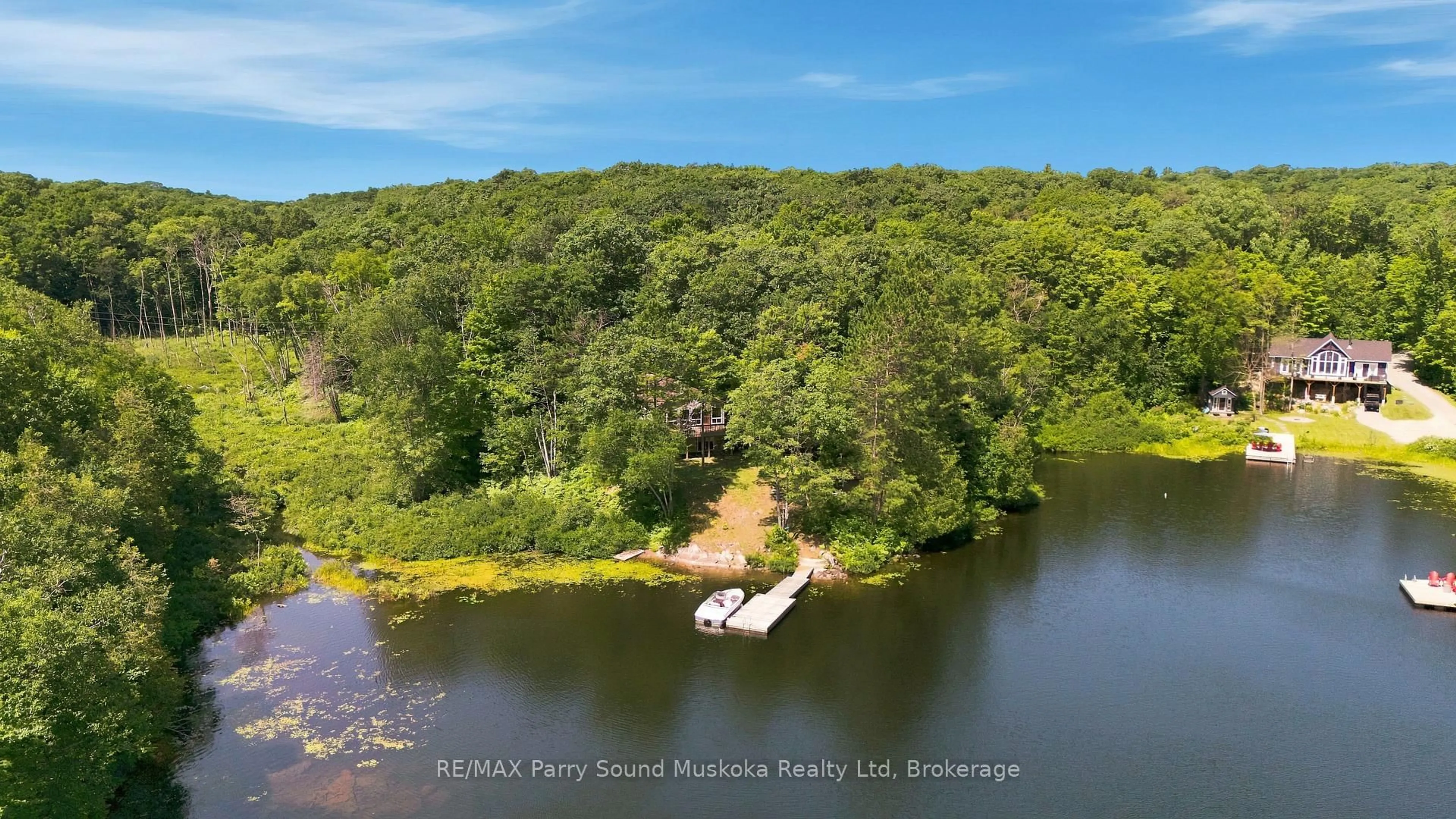 A pic from outside/outdoor area/front of a property/back of a property/a pic from drone, water/lake/river/ocean view for 889 185 WA Horseshoe Lake, Seguin Ontario P2A 2W8