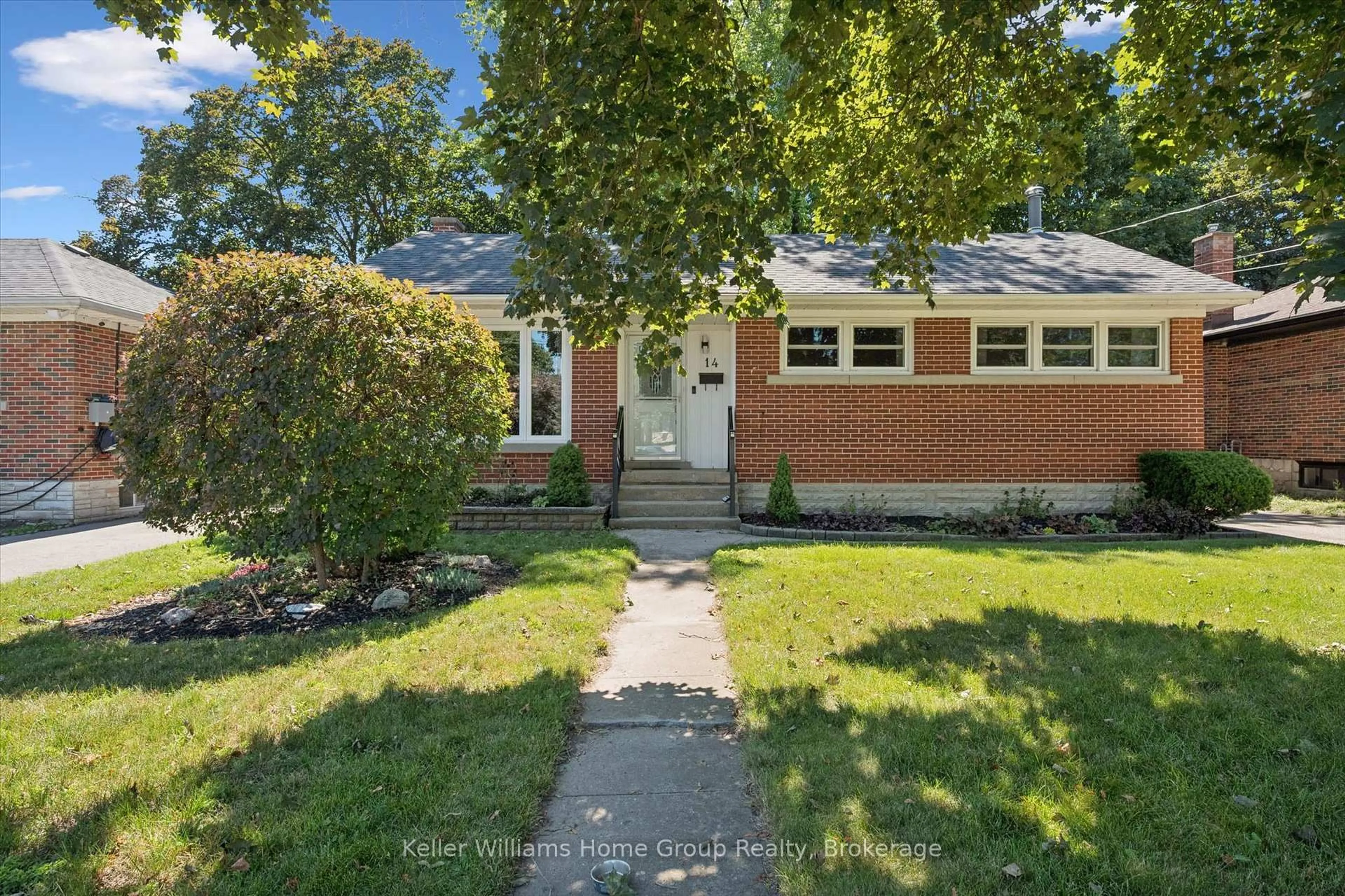 Home with brick exterior material, street for 14 Skov Cres, Guelph Ontario N1E 4B7