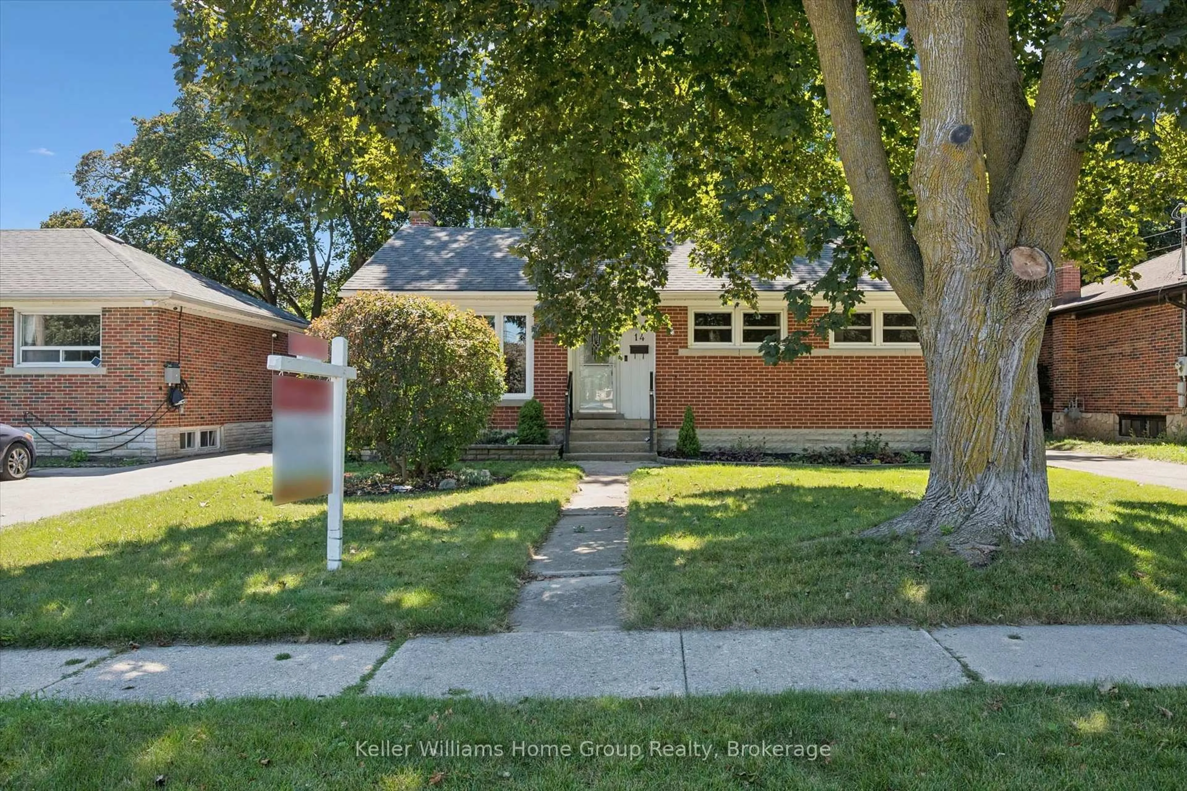 Home with brick exterior material, street for 14 Skov Cres, Guelph Ontario N1E 4B7