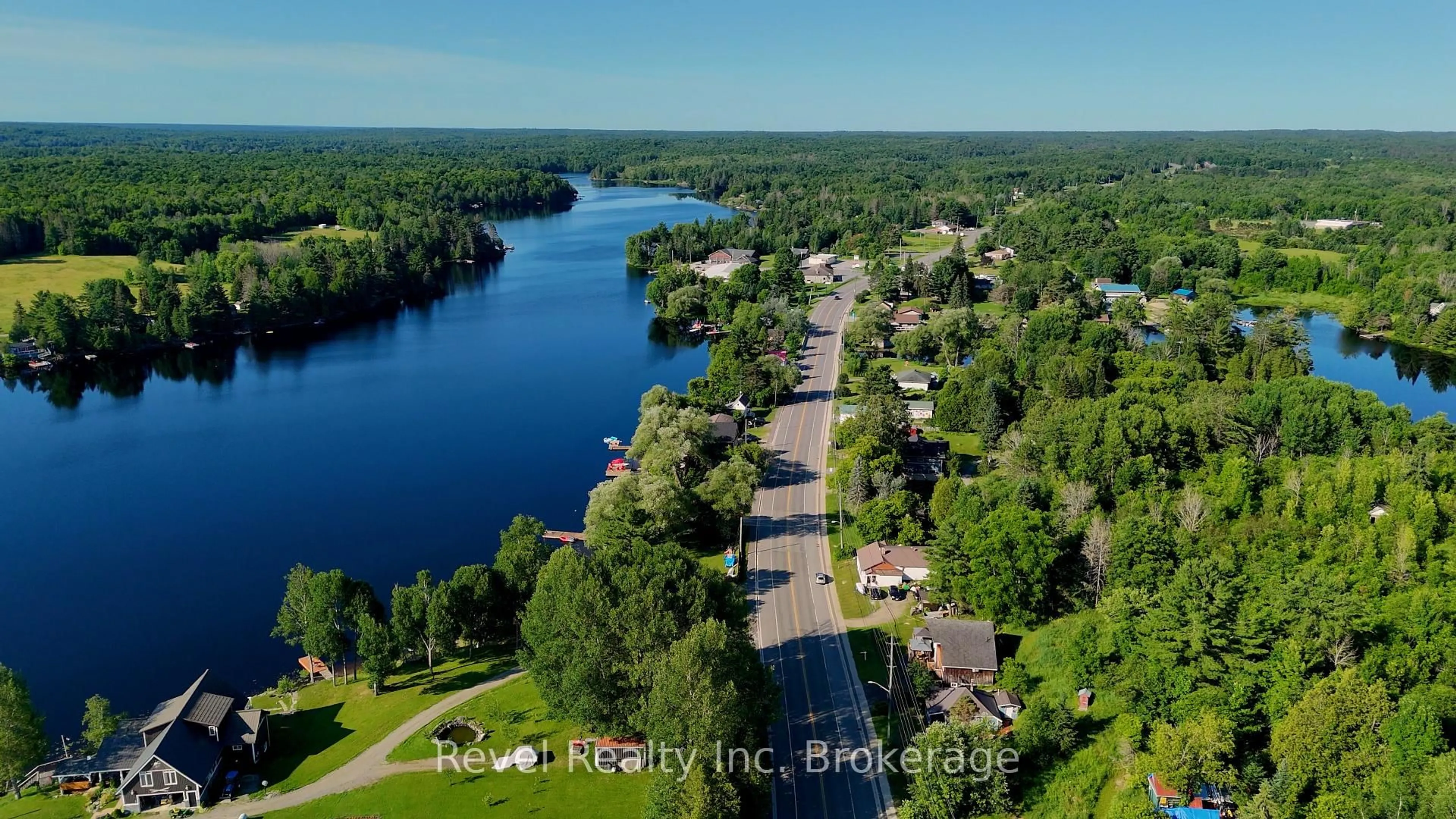 A pic from outside/outdoor area/front of a property/back of a property/a pic from drone, water/lake/river/ocean view for 2242 Highway 124, Whitestone Ontario P0A 1G0