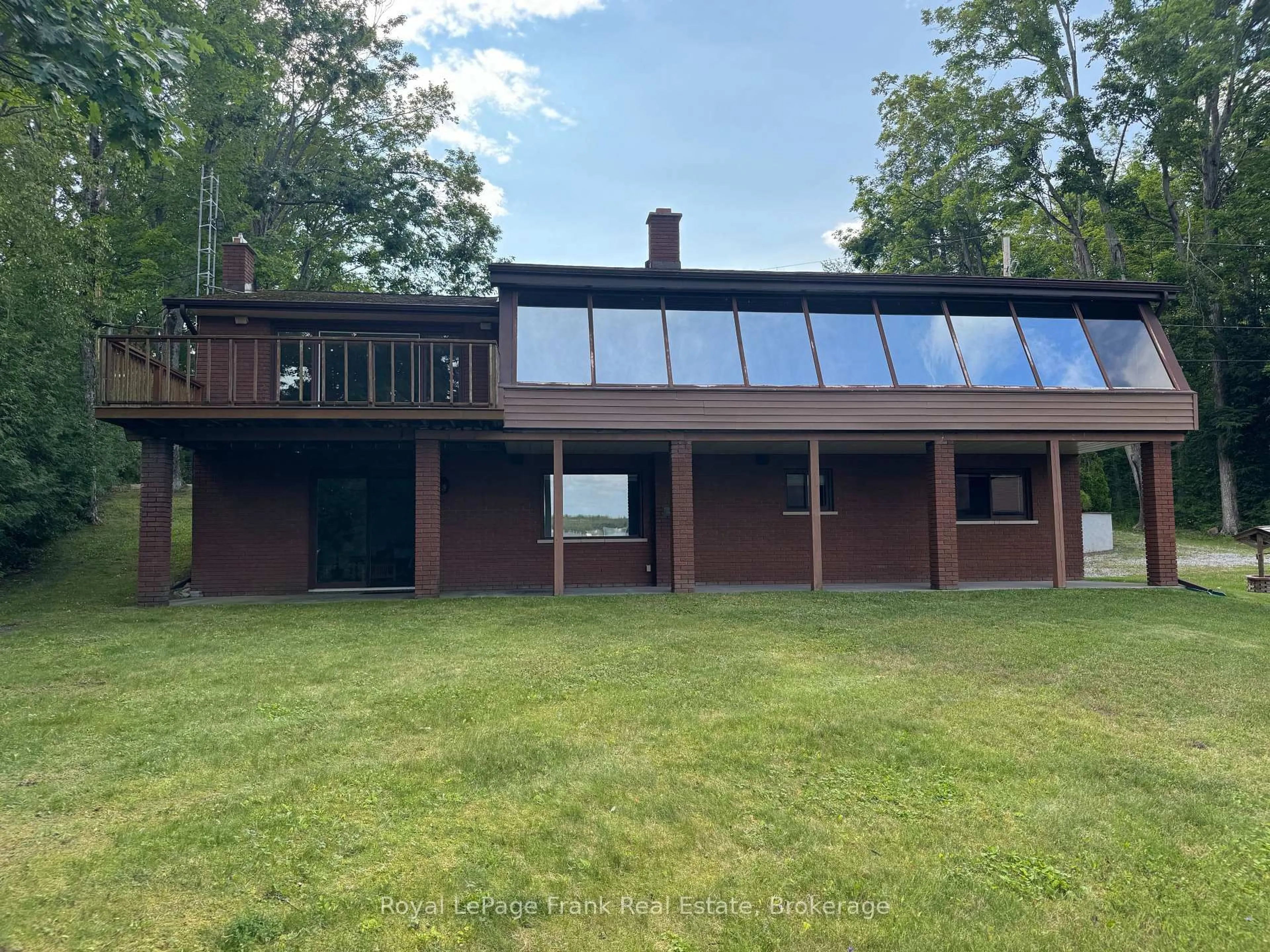 A pic from outside/outdoor area/front of a property/back of a property/a pic from drone, unknown for 36 Fire Route 28, Trent Lakes Ontario K0L 1J0