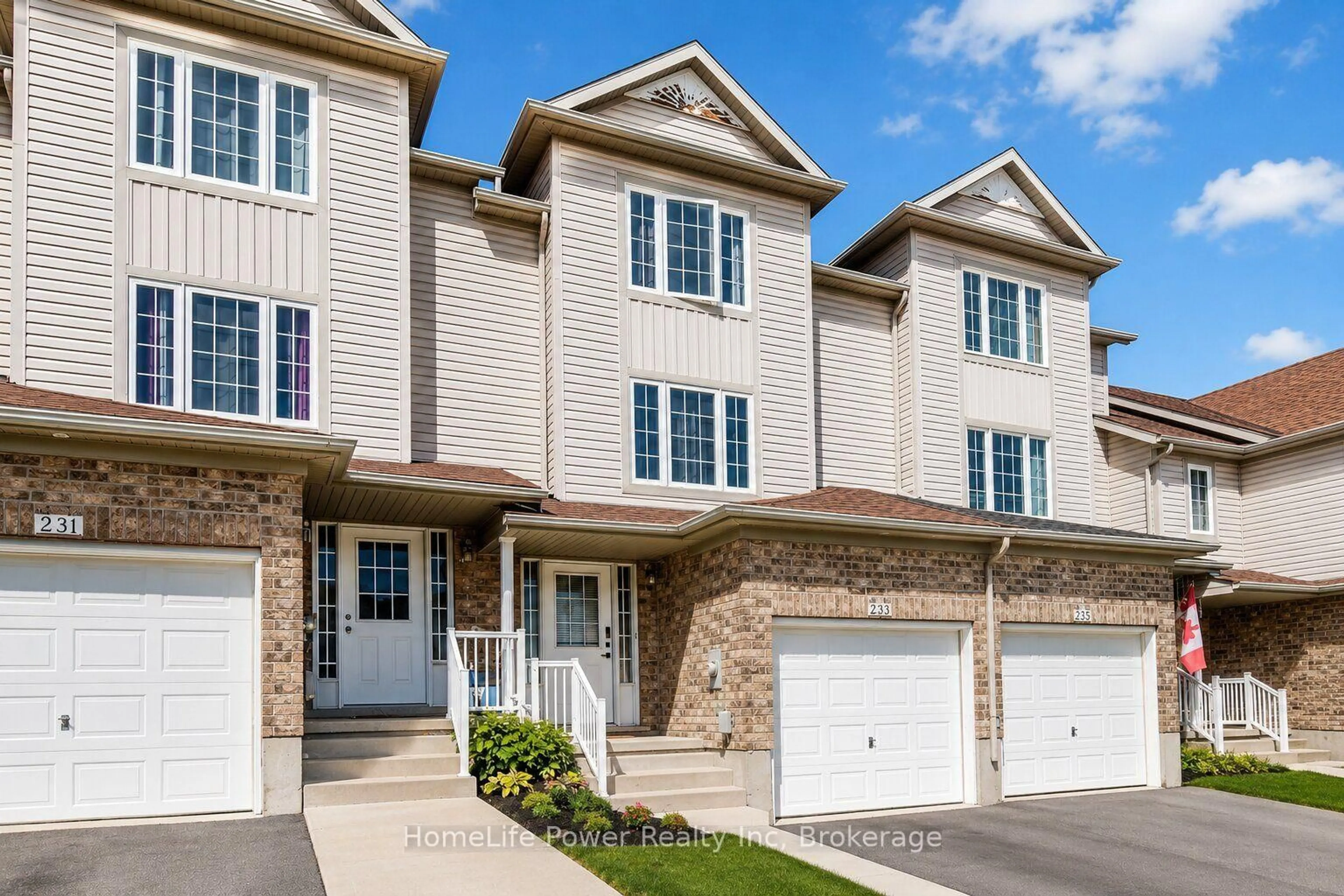 Home with vinyl exterior material, street for 233 RED CLOVER Crt, Kitchener Ontario N2E 4J5