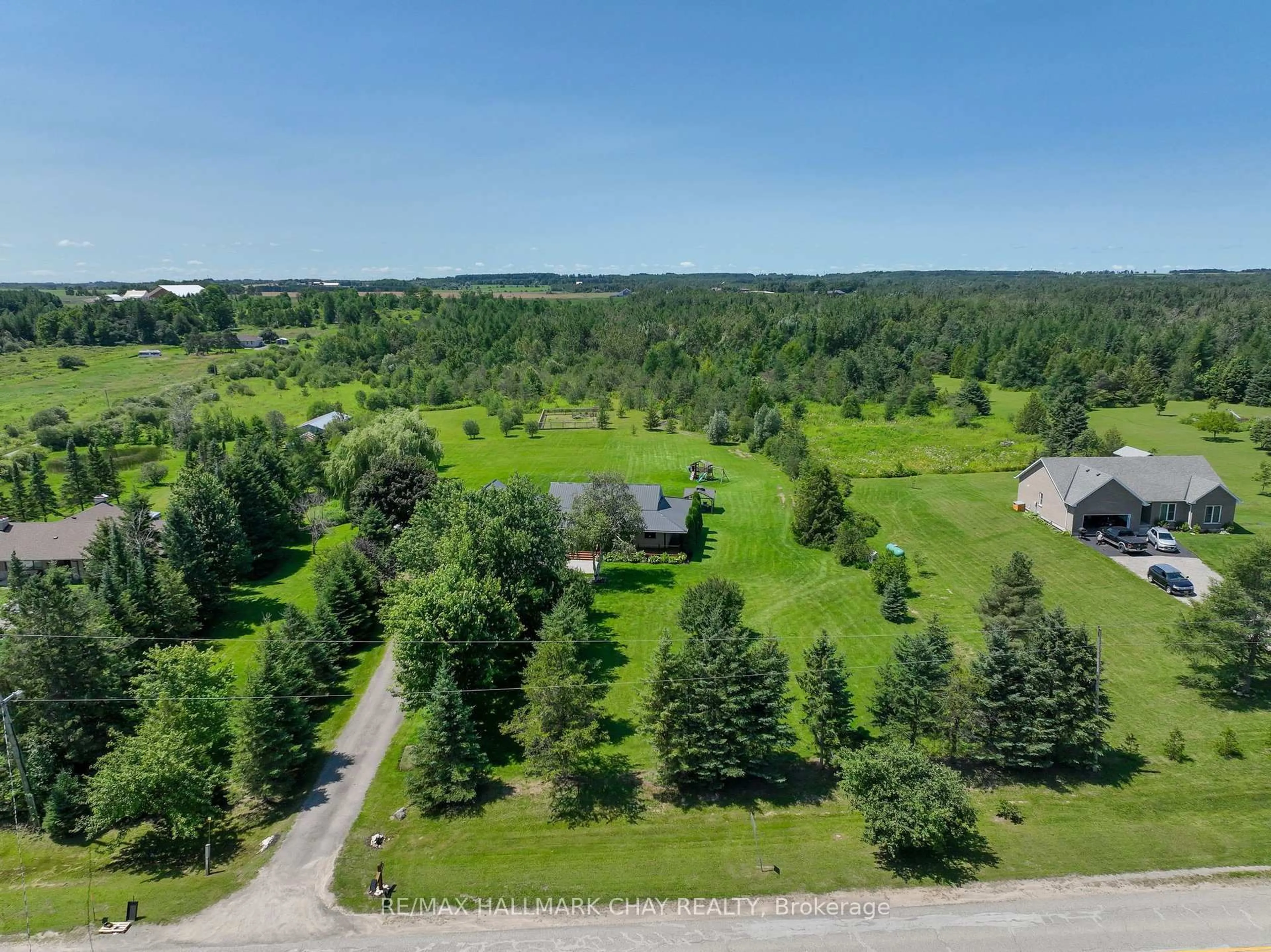 A pic from outside/outdoor area/front of a property/back of a property/a pic from drone, forest/trees view for 555142 Mono-Amaranth Town Line, Amaranth Ontario L9W 0T3