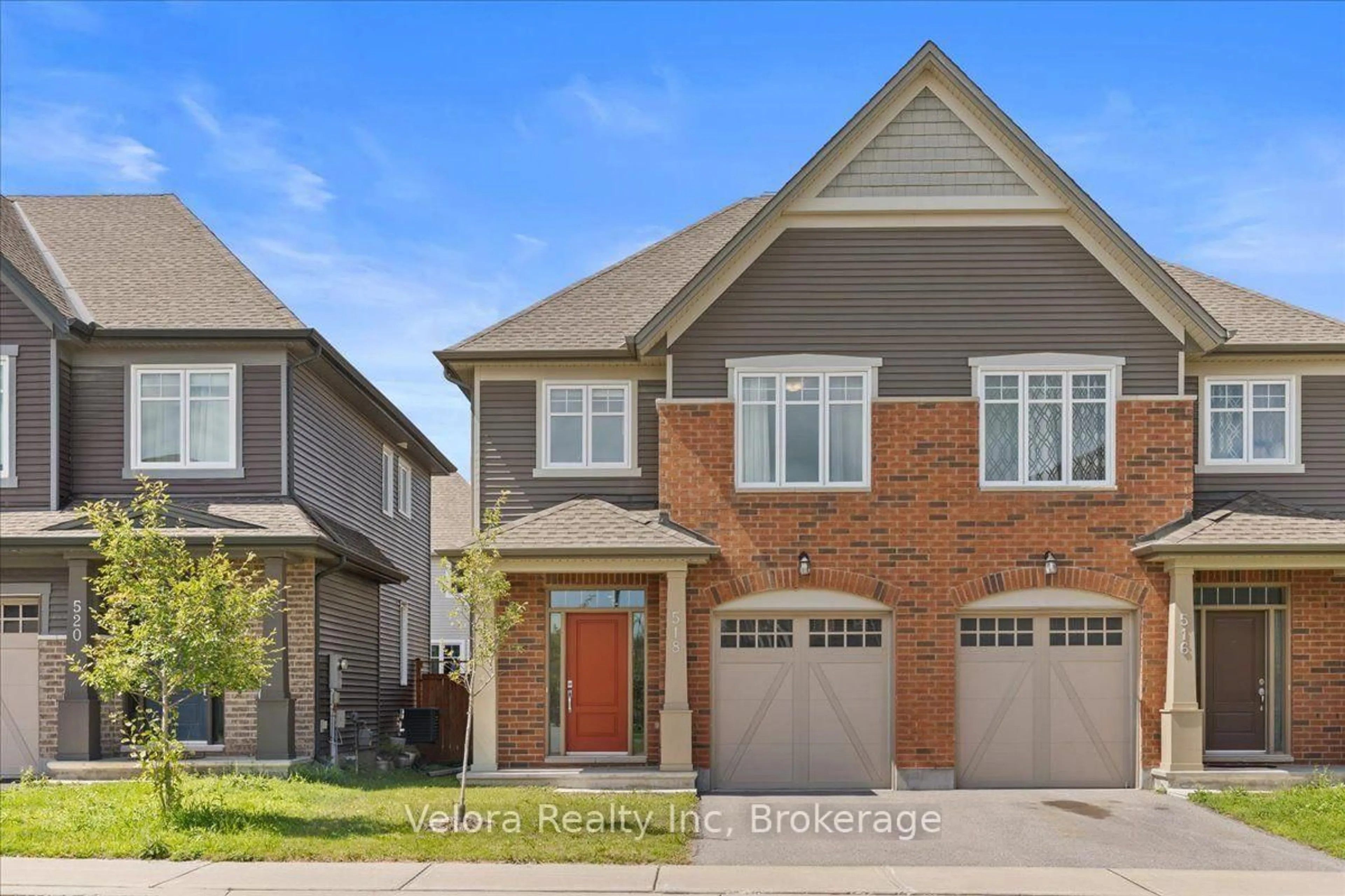 Home with brick exterior material, street for 518 Vivera Pl, Stittsville Ontario K2S 0W2