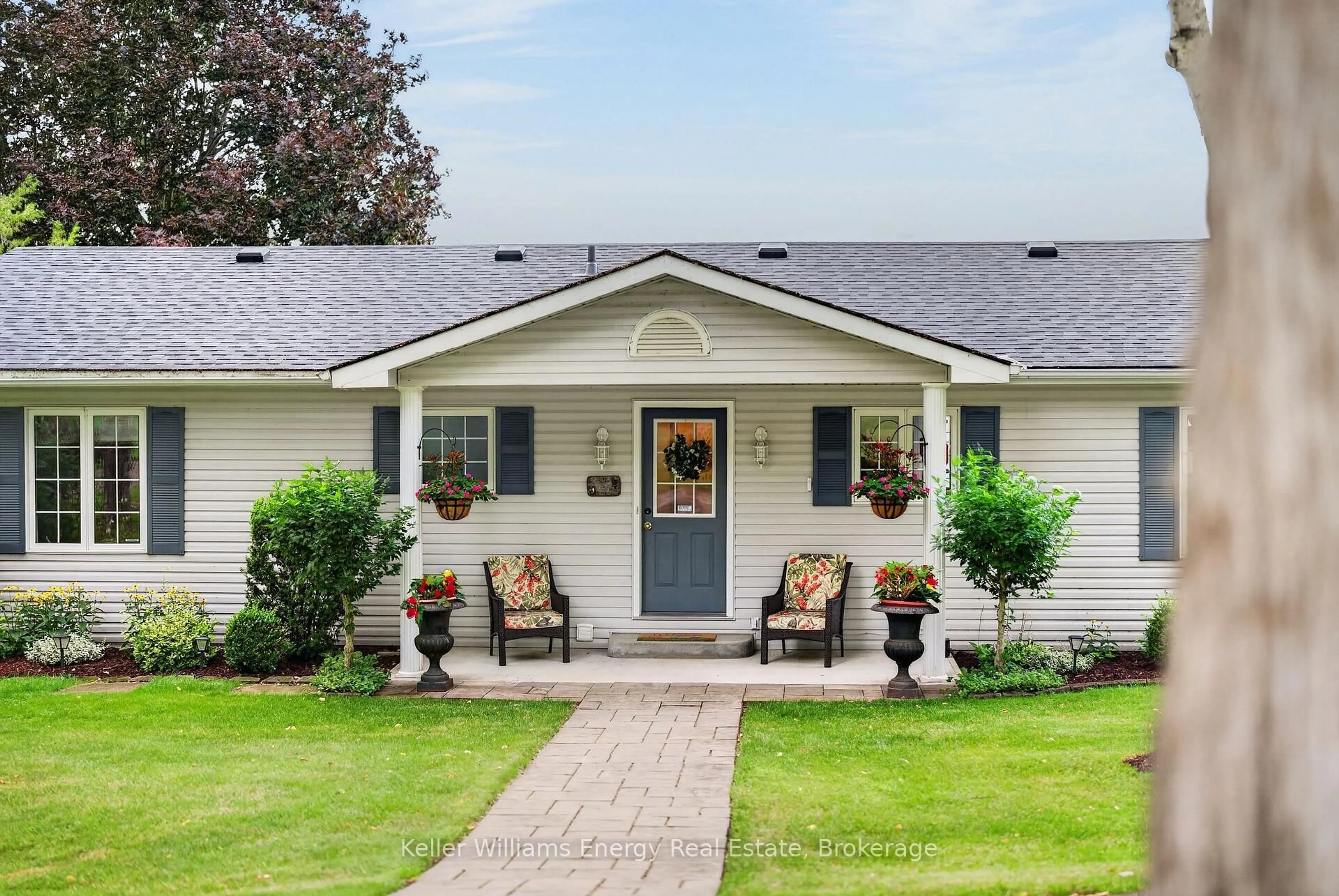 Home with vinyl exterior material, street for 52 Rowlands Lane, Prince Edward County Ontario K0K 1A0