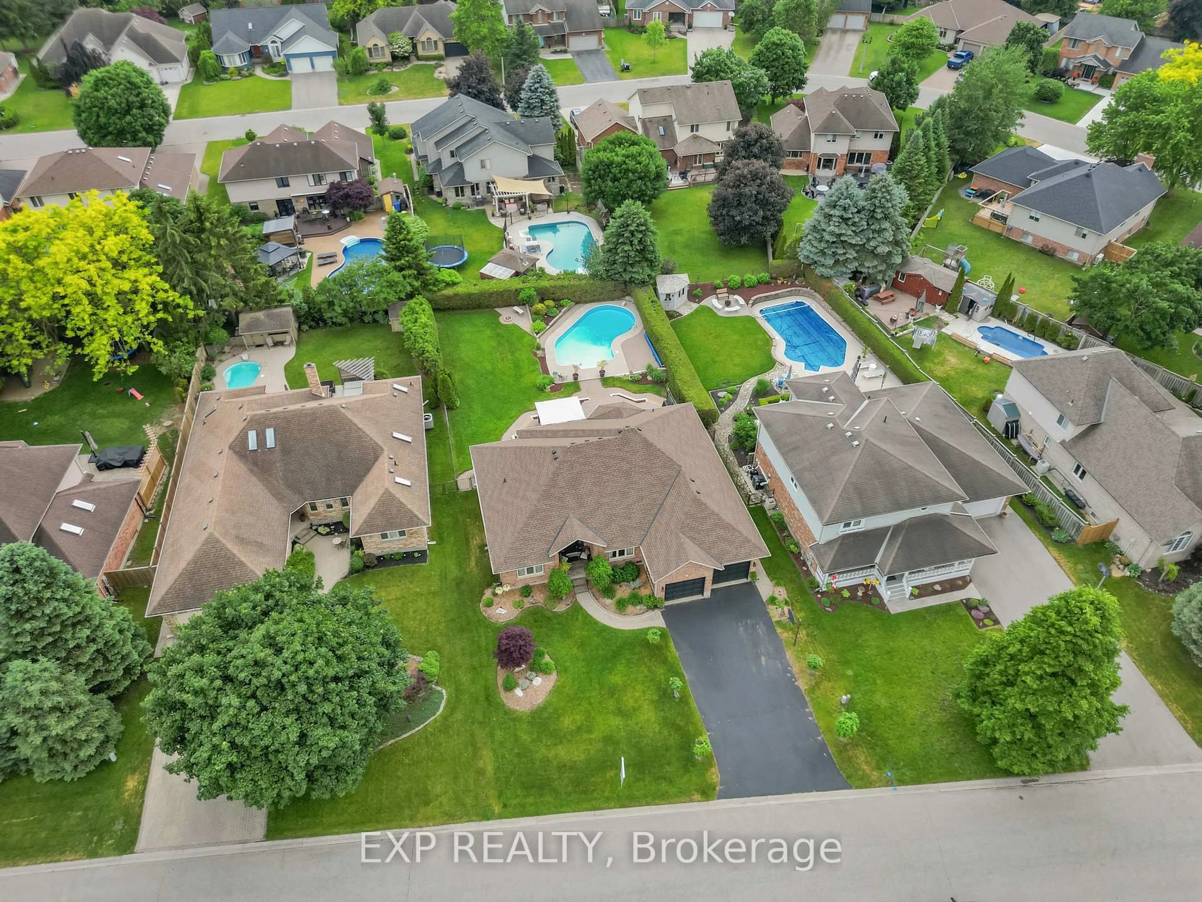 A pic from outside/outdoor area/front of a property/back of a property/a pic from drone, water/lake/river/ocean view for 57 Valleyview Cres, Thames Centre Ontario N0L 1G3