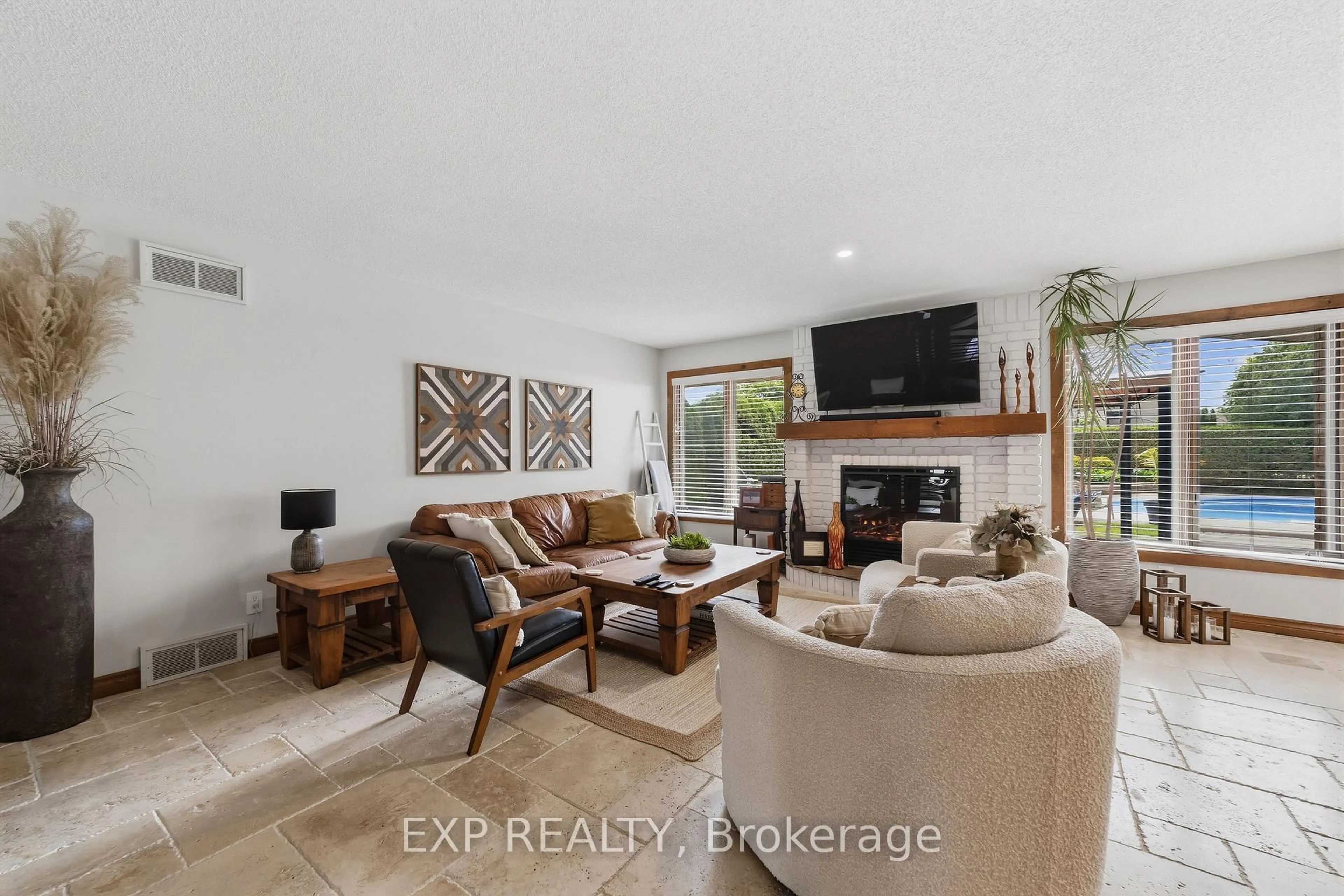 Living room with furniture, ceramic/tile floor for 57 Valleyview Cres, Thames Centre Ontario N0L 1G3
