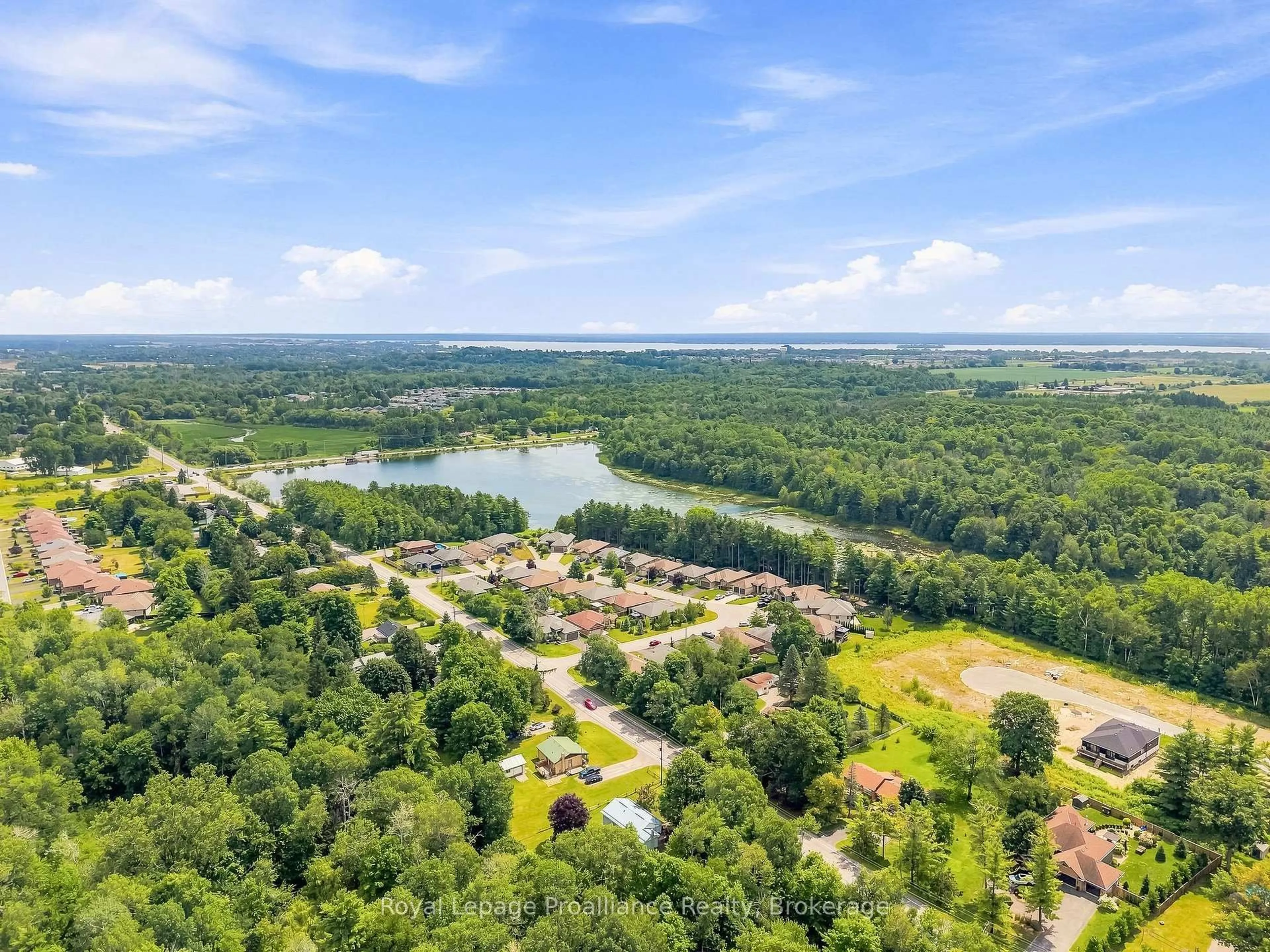A pic from outside/outdoor area/front of a property/back of a property/a pic from drone, water/lake/river/ocean view for 39 Lakewood Cres, Ingleside Ontario K8V 5P4