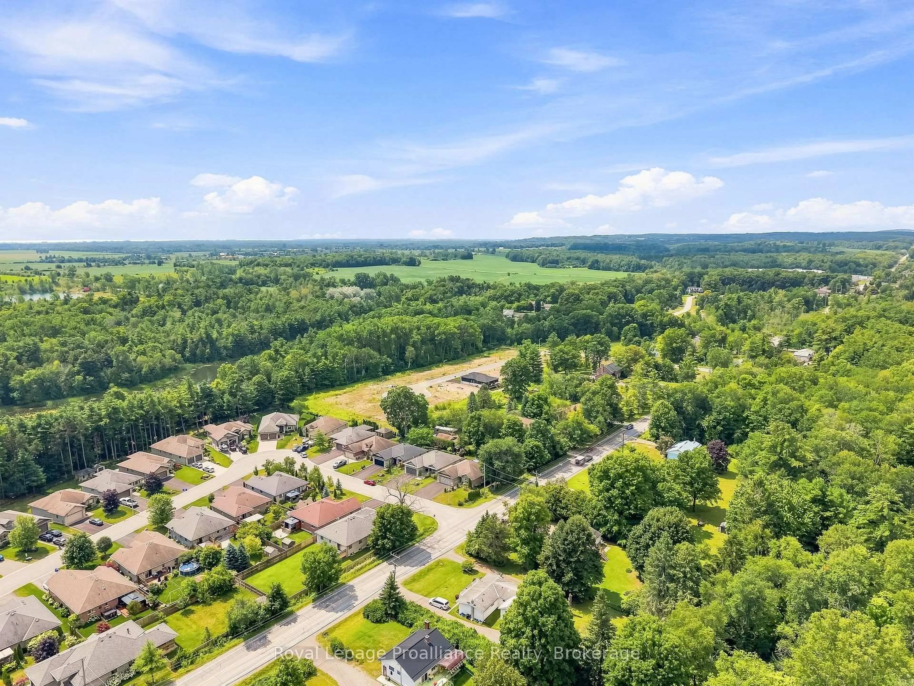 A pic from outside/outdoor area/front of a property/back of a property/a pic from drone, forest/trees view for 39 Lakewood Cres, Ingleside Ontario K8V 5P4
