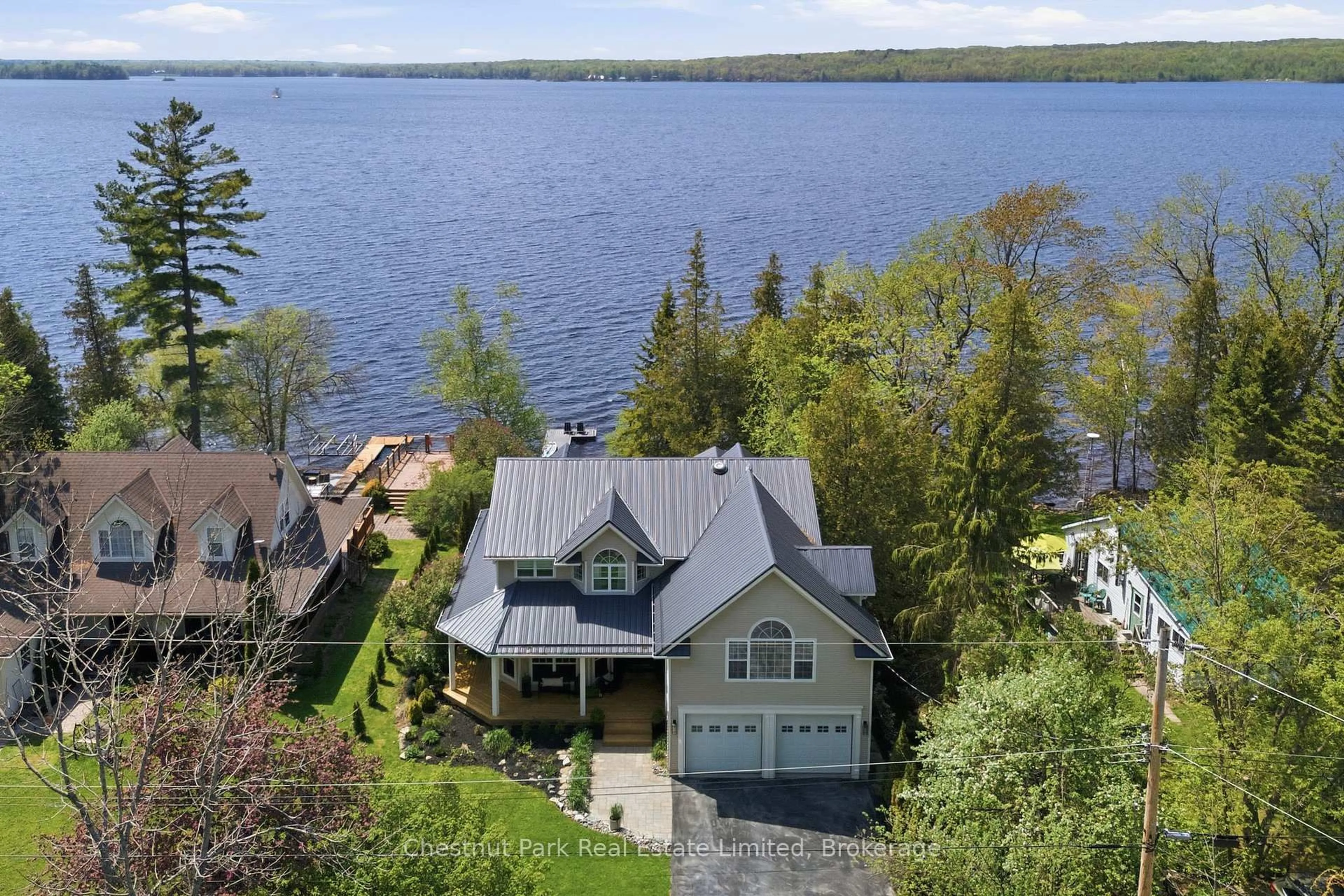 A pic from outside/outdoor area/front of a property/back of a property/a pic from drone, water/lake/river/ocean view for 50 Tipperary Rd, Limoges Ontario K0K 2M0