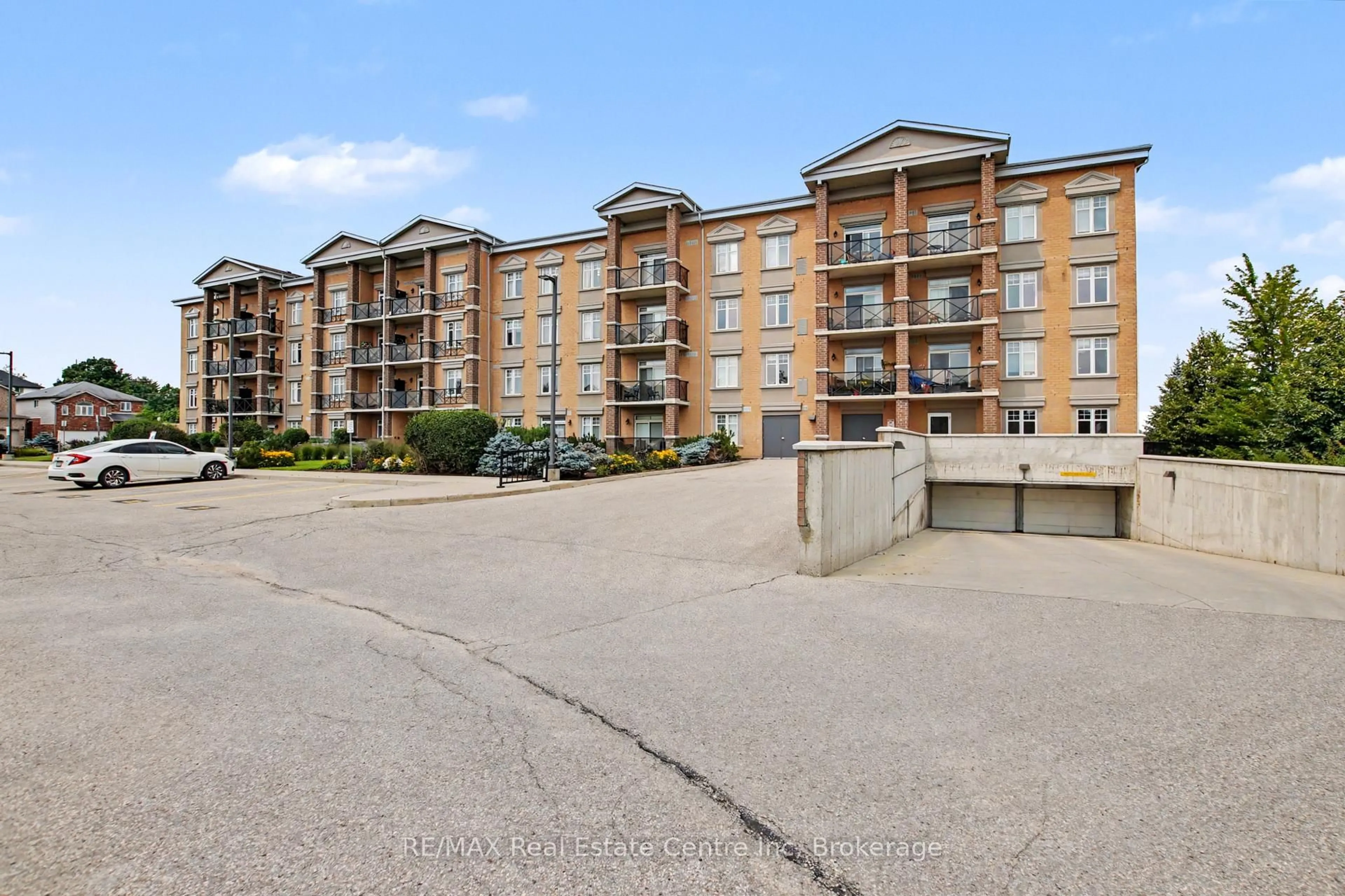 A pic from outside/outdoor area/front of a property/back of a property/a pic from drone, unknown for 2 Colonial Dr #410, Guelph Ontario N1L 0K8