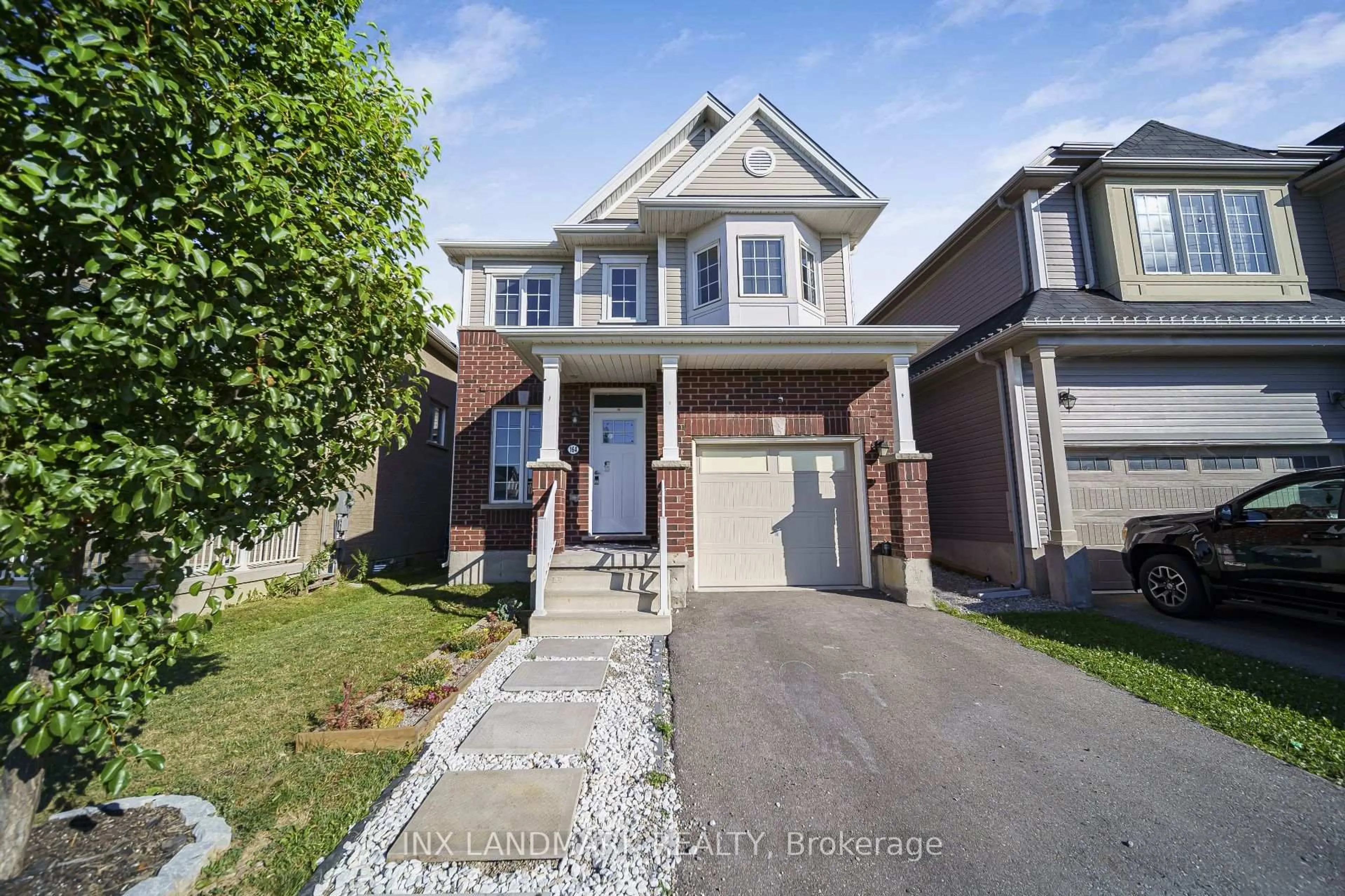 Home with brick exterior material, street for 164 Munro Circ, Brantford Ontario N3T 0R3