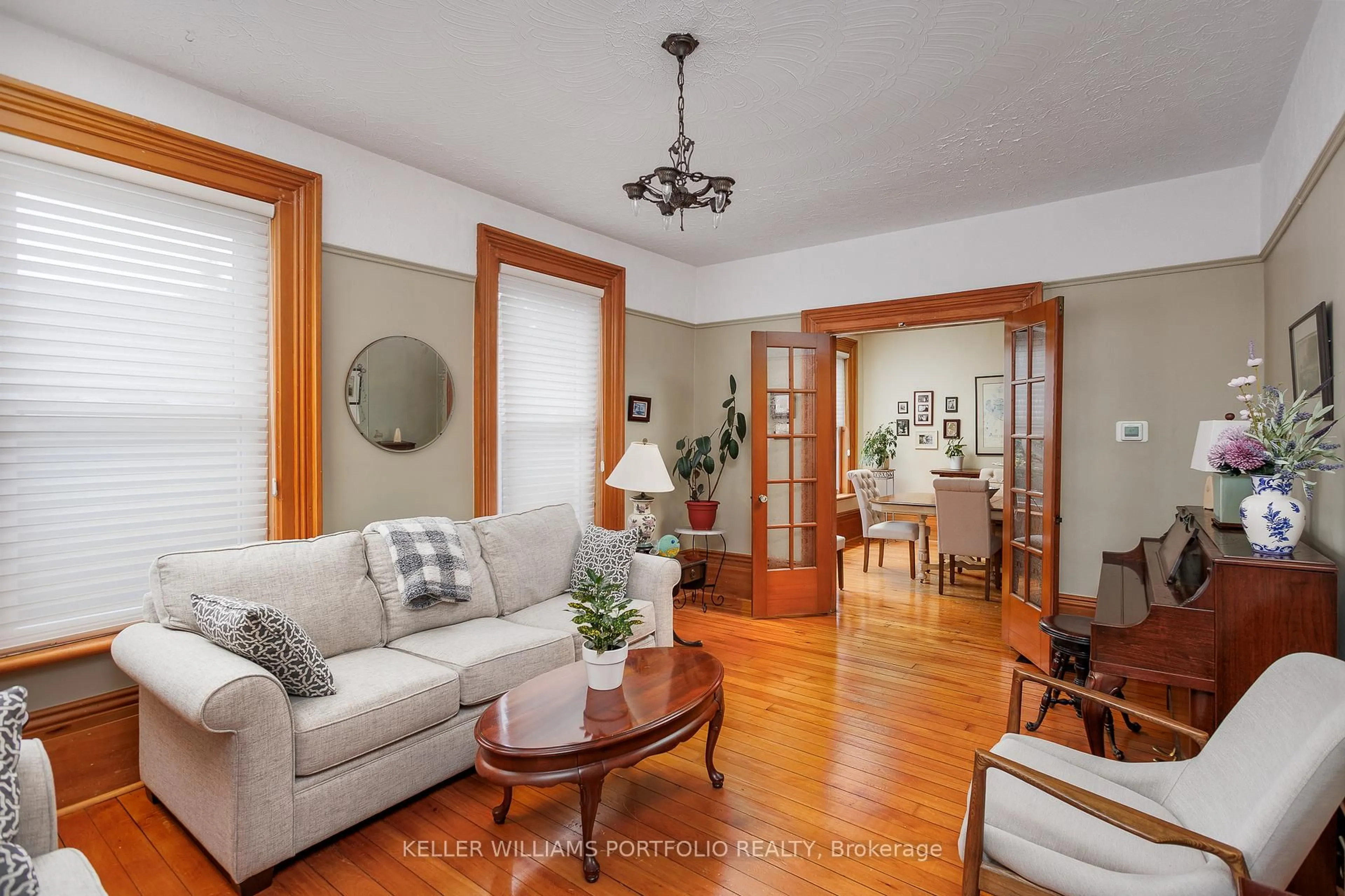 Living room with furniture, wood/laminate floor for 191 Stuart St, Cobourg Ontario K9A 2Y1