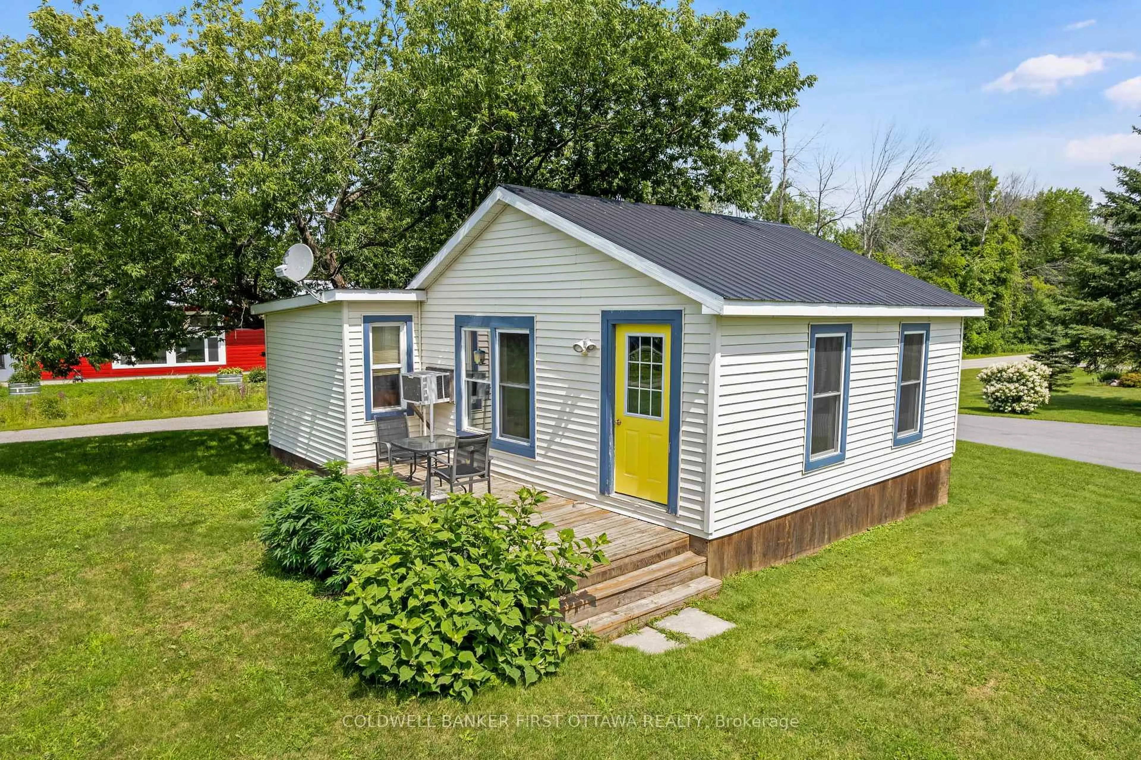 A pic from outside/outdoor area/front of a property/back of a property/a pic from drone, street for 127 Rose Mac Dr, Rideau Ferry Ontario K0G 1W0