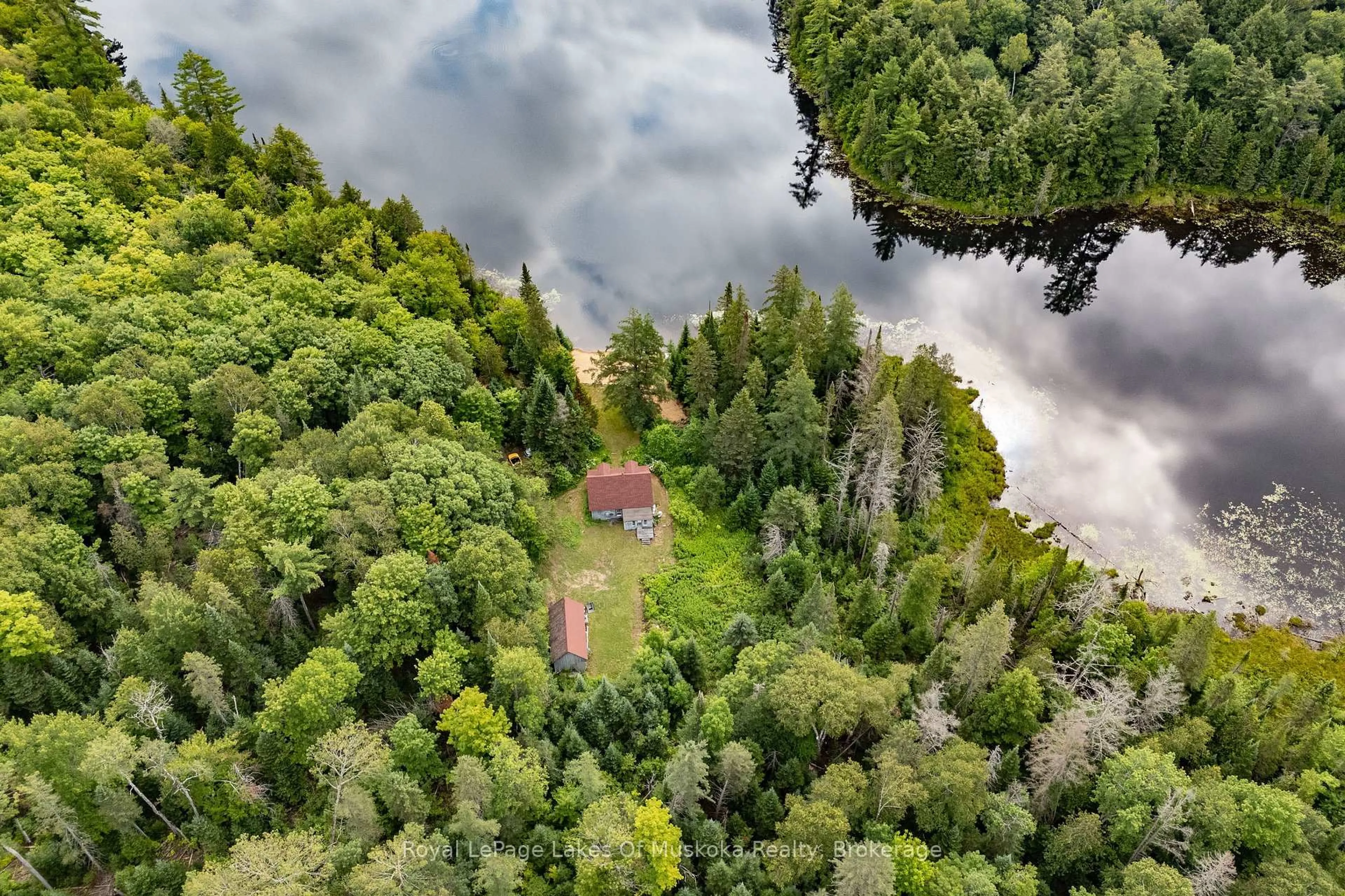 A pic from outside/outdoor area/front of a property/back of a property/a pic from drone, water/lake/river/ocean view for 1099 Wolfkin Lake Rd, Lake of Bays Ontario P0B 1A0