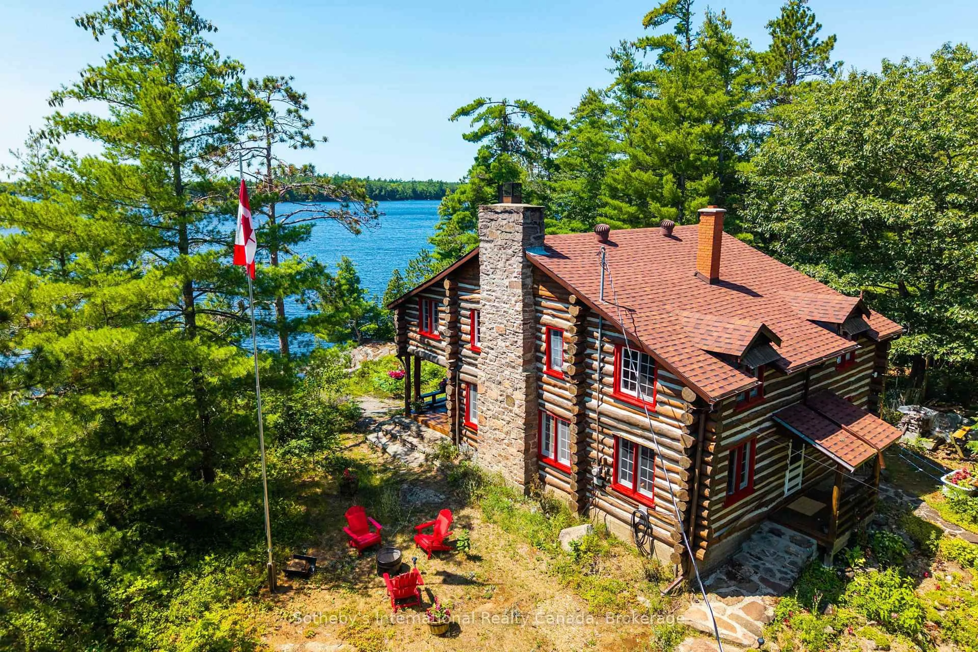 A pic from outside/outdoor area/front of a property/back of a property/a pic from drone, water/lake/river/ocean view for 1 Island 29kl Kahshe Lake - Cooee Island, Gravenhurst Ontario P0E 1G0