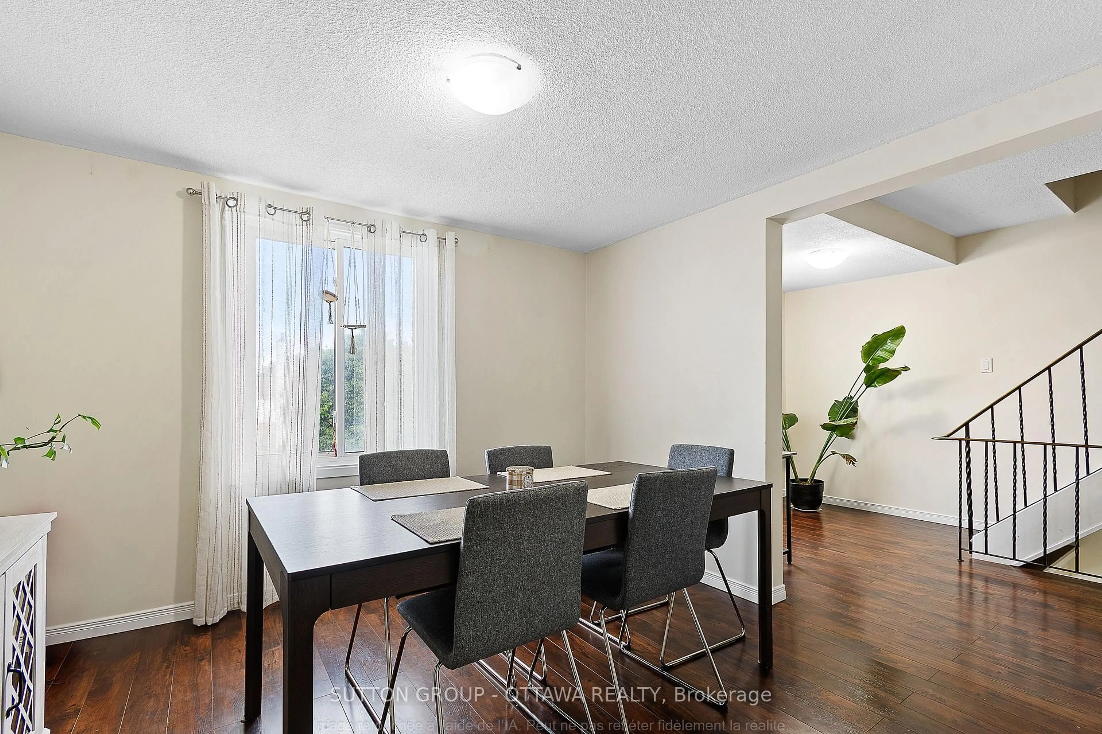 Dining room, wood/laminate floor for 1803 Axminster Crt #39, Ottawa Ontario K1C 1Z5
