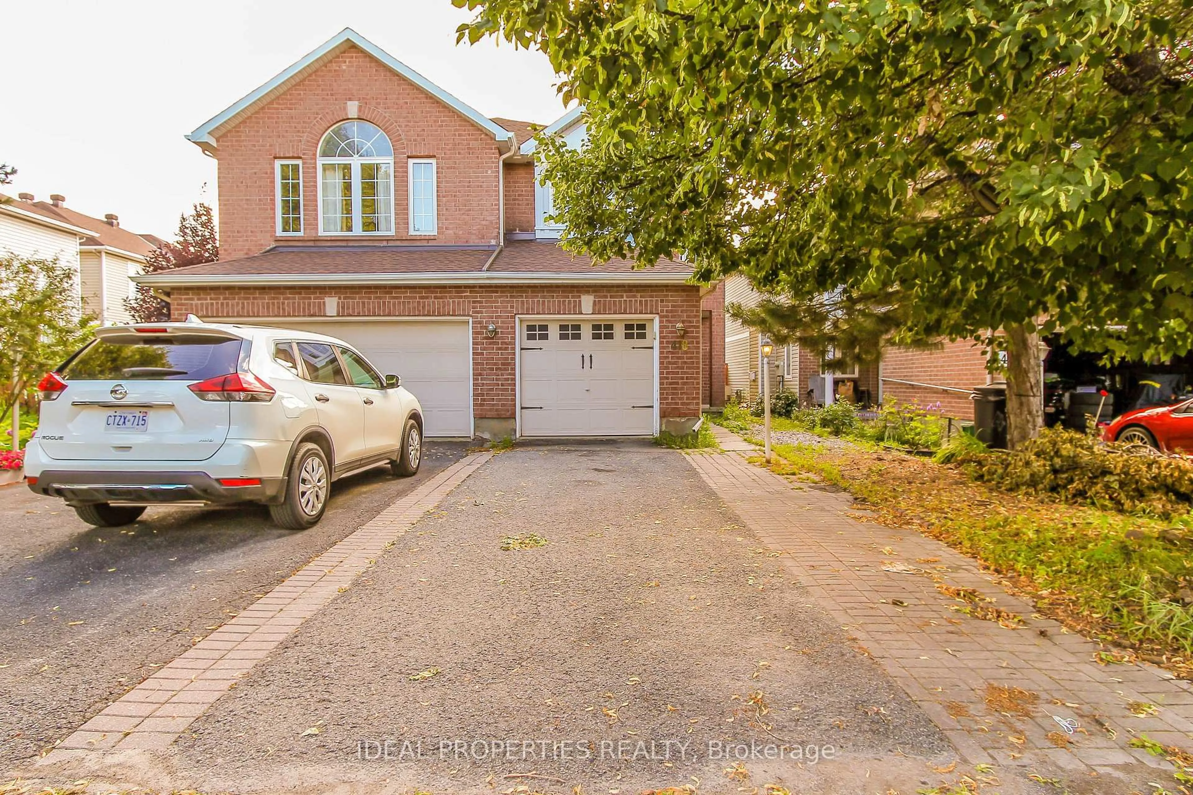 Home with brick exterior material, street for 418 Beatrice Dr, Ottawa Ontario K2J 4W9