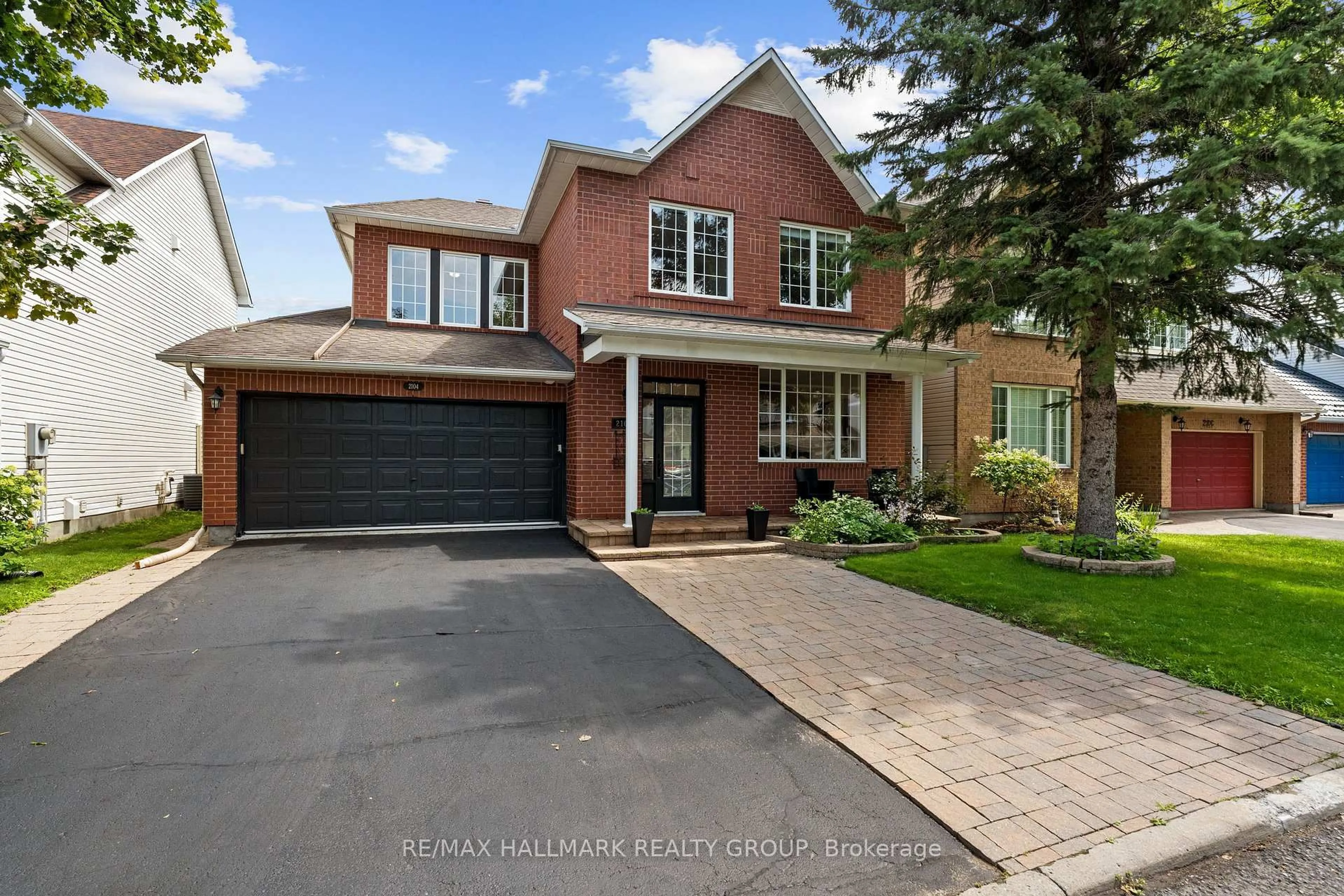 Home with brick exterior material, street for 2104 Sandy Oaks Dr, Ottawa Ontario K1W 1H5