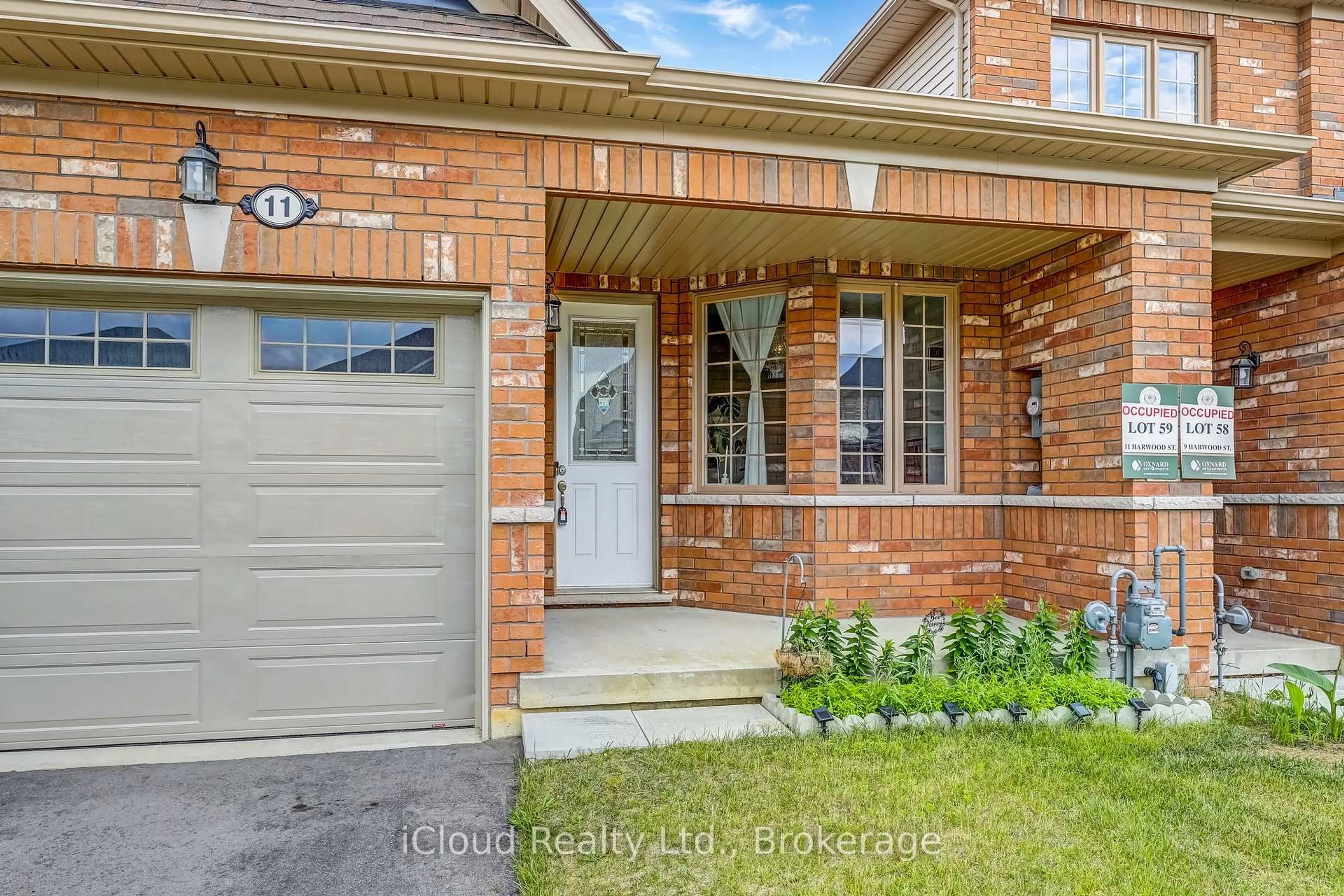 Home with brick exterior material, street for 11 Harwood St, Tillsonburg Ontario N4G 0J7