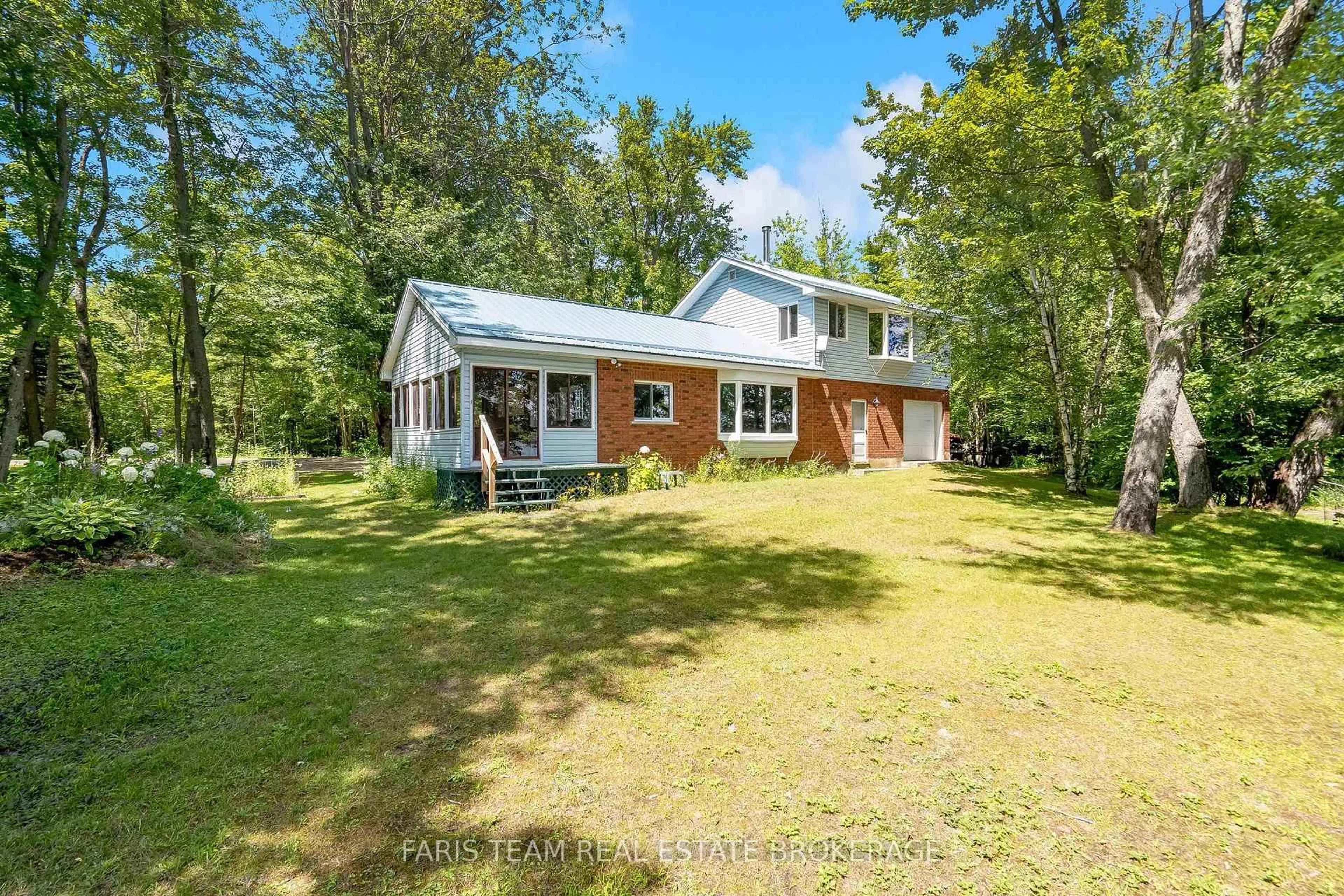 A pic from outside/outdoor area/front of a property/back of a property/a pic from drone, water/lake/river/ocean view for 98 McLeish Dr, Kawartha Lakes Ontario L0K 1W0