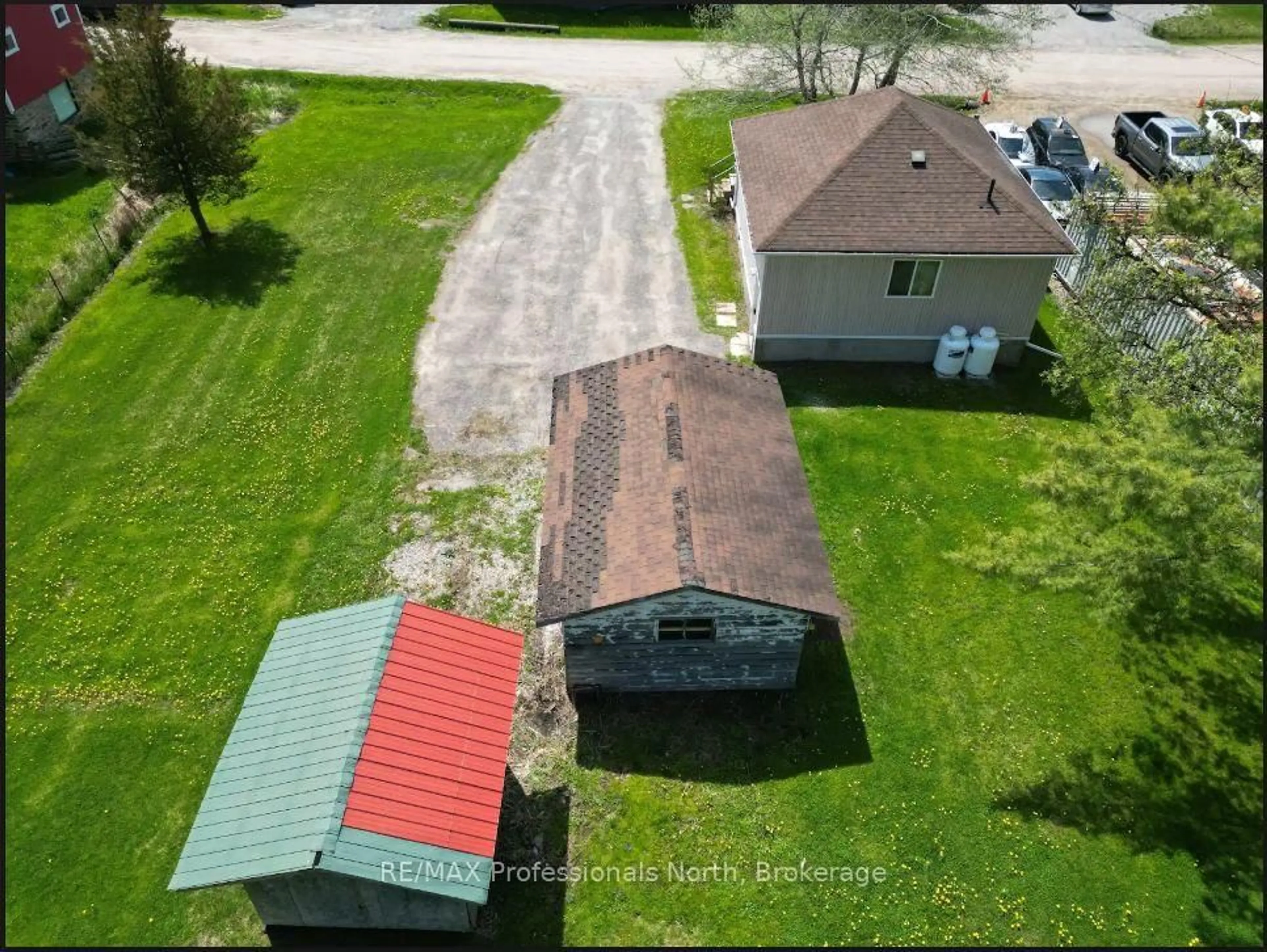 A pic from outside/outdoor area/front of a property/back of a property/a pic from drone, street for 14 Chandos St, Minden Hills Ontario K0M 2K0