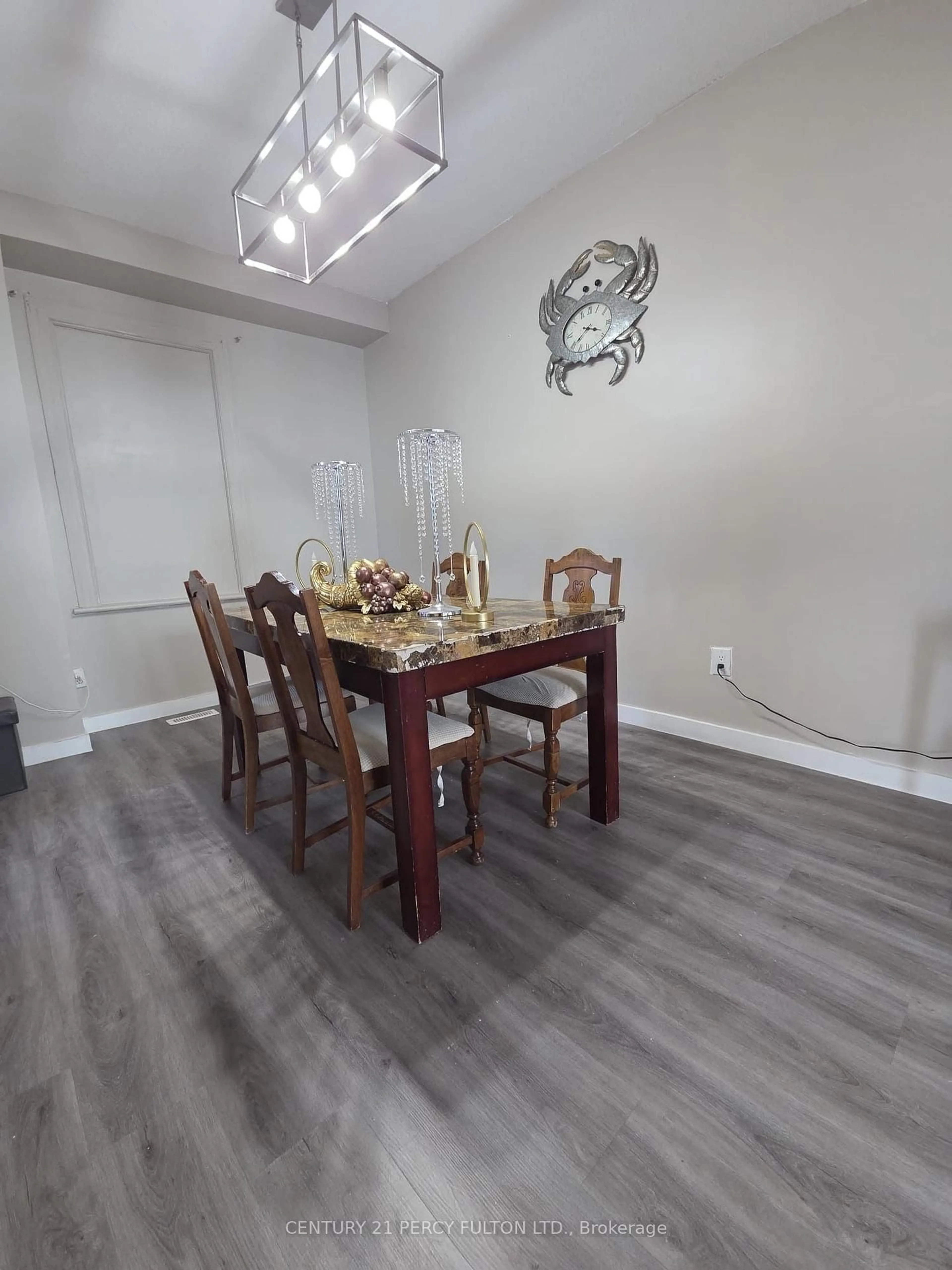 Dining room, wood/laminate floor for 130 Stirton St, Hamilton Ontario L8L 6G2