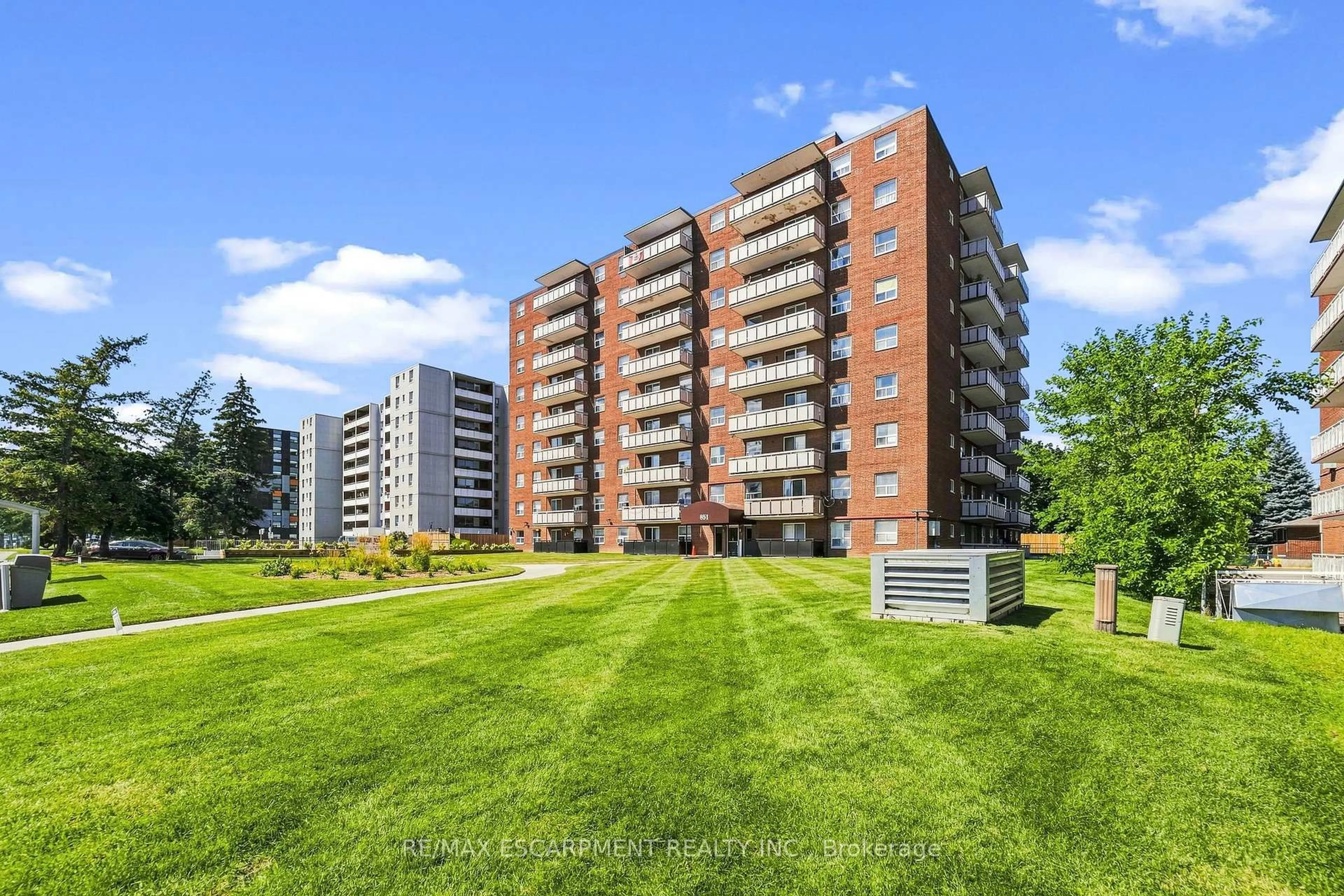 A pic from outside/outdoor area/front of a property/back of a property/a pic from drone, building for 851 Queenston Rd #202, Hamilton Ontario L8H 4X5
