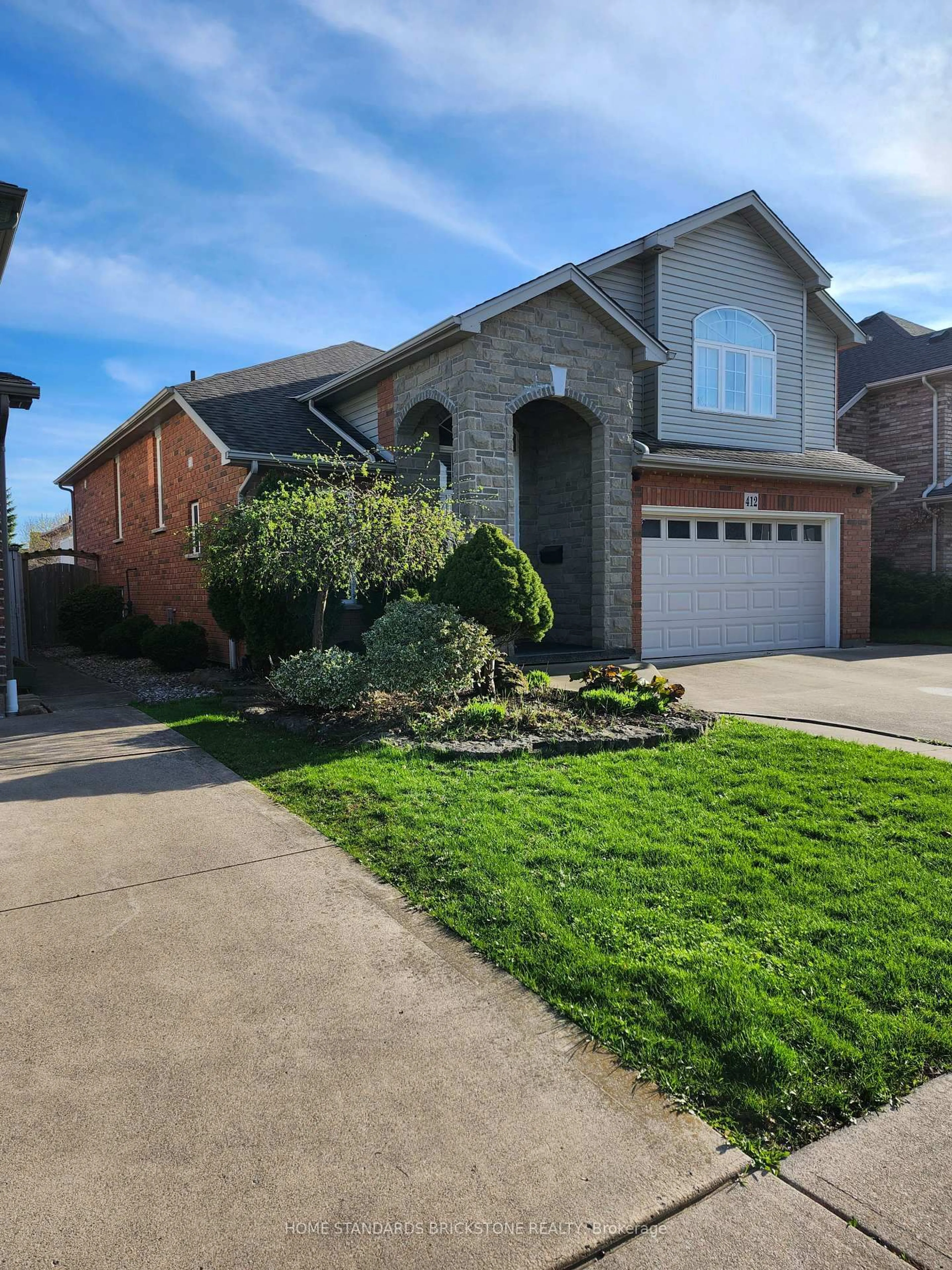 Home with brick exterior material, street for 412 Autumn Cres, Welland Ontario L3C 7J9