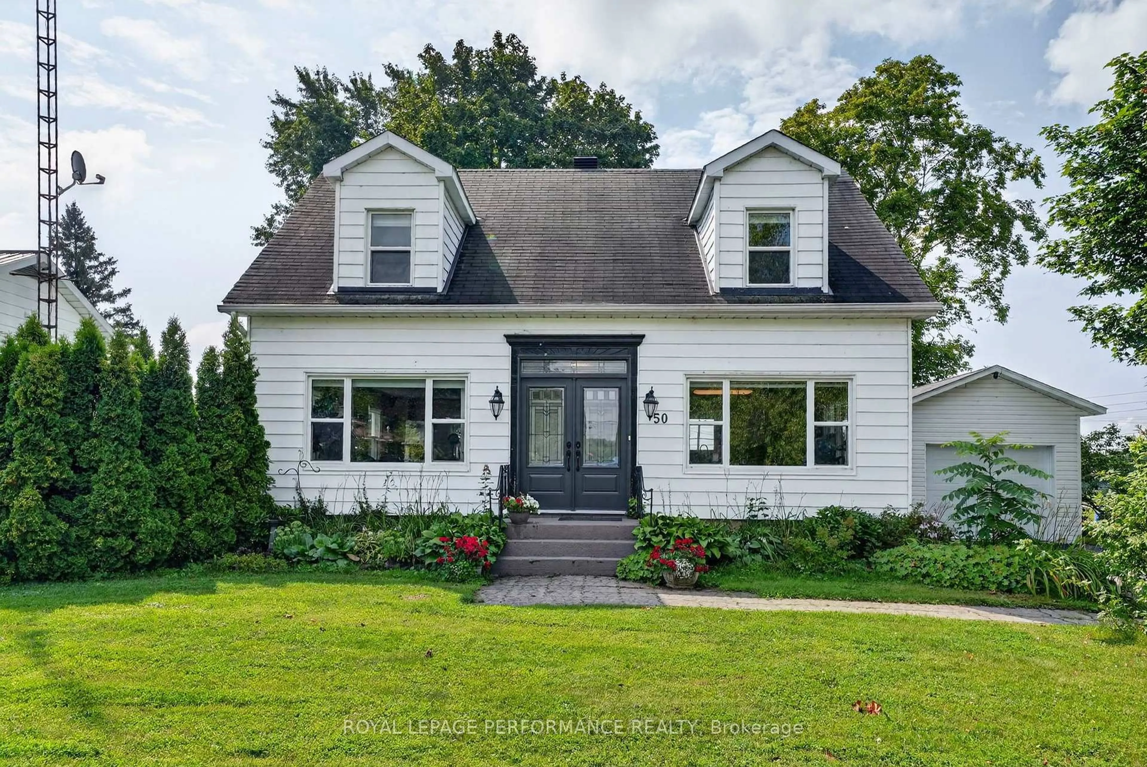 Home with vinyl exterior material, street for 50 St Lawrence St, South Stormont Ontario K0C 1M0