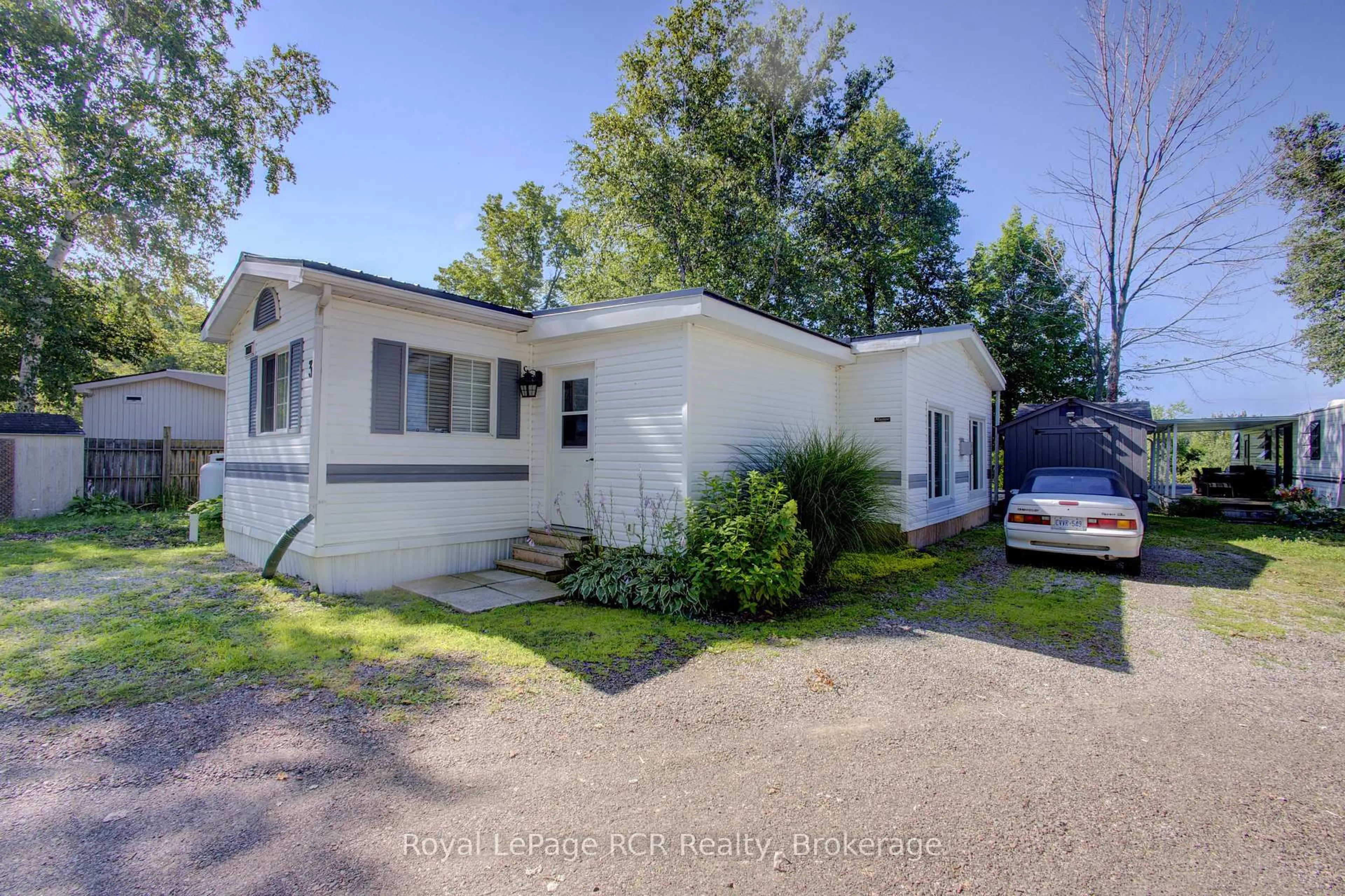 Home with vinyl exterior material, street for 79681 Bluewater Hwy 21 #3 Maple St, Central Huron Ontario N7A 3X8
