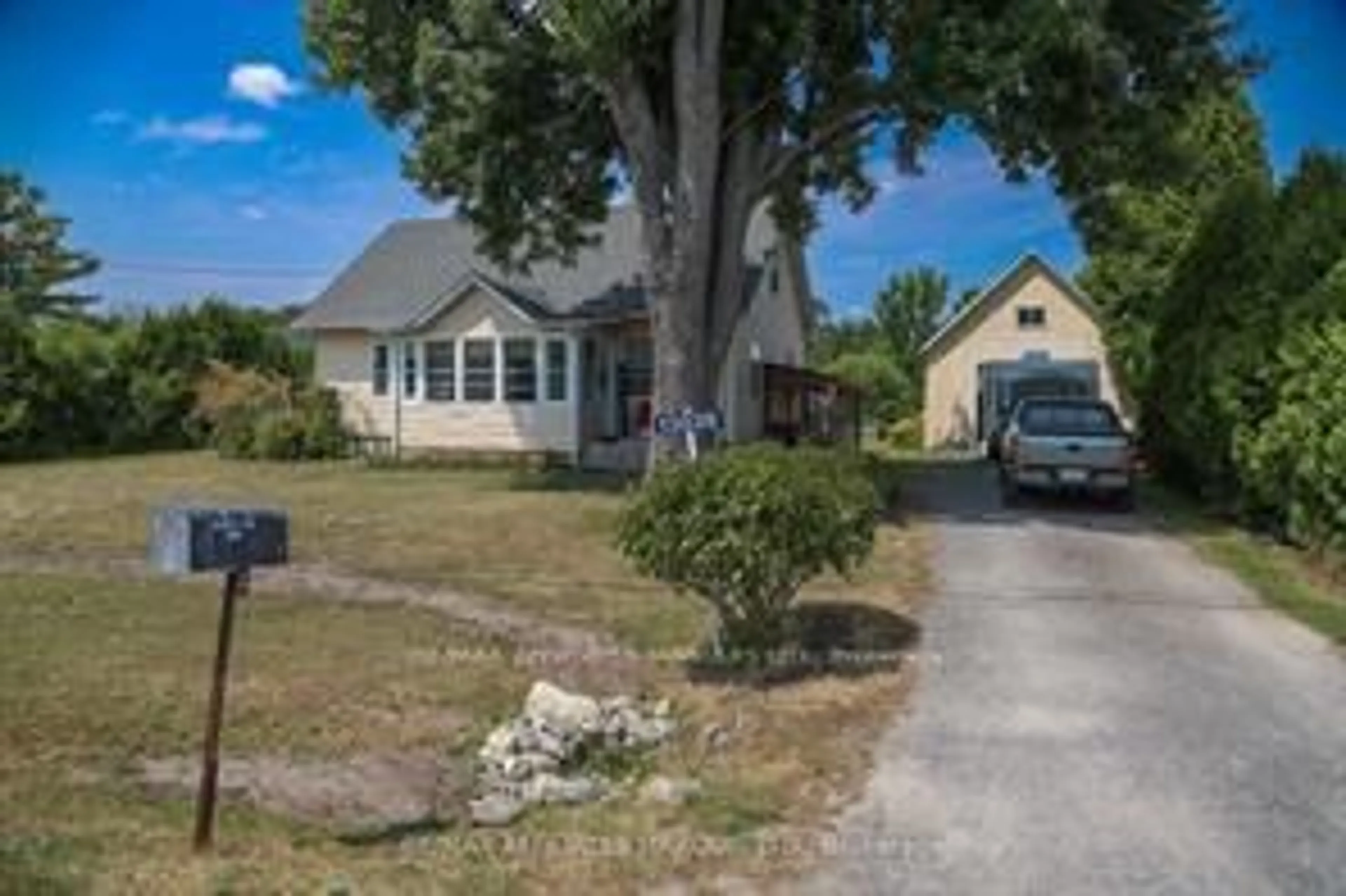 A pic from outside/outdoor area/front of a property/back of a property/a pic from drone, street for 13039 Riverside Dr, South Dundas Ontario K0C 1X0