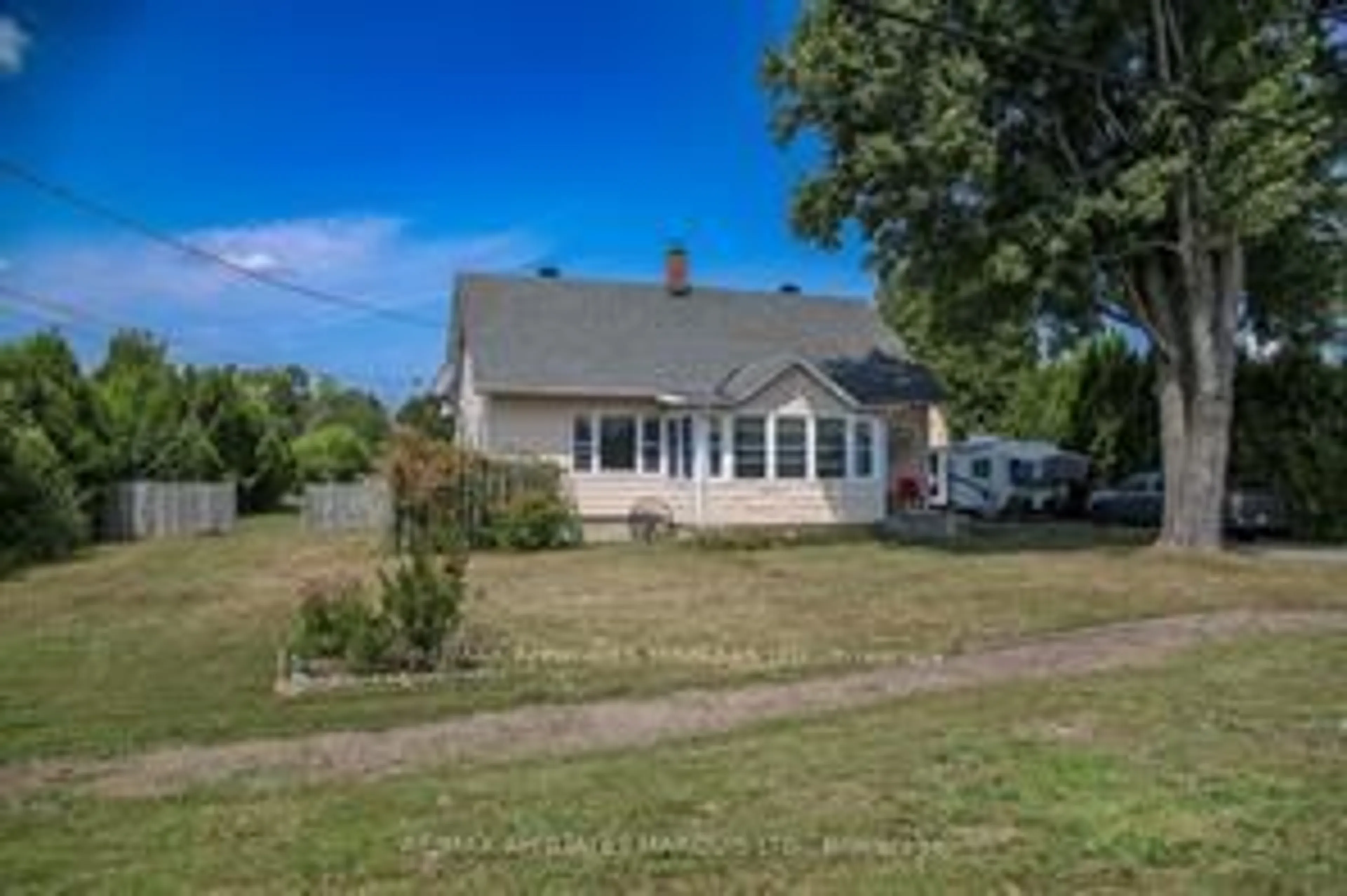 A pic from outside/outdoor area/front of a property/back of a property/a pic from drone, street for 13039 Riverside Dr, South Dundas Ontario K0C 1X0