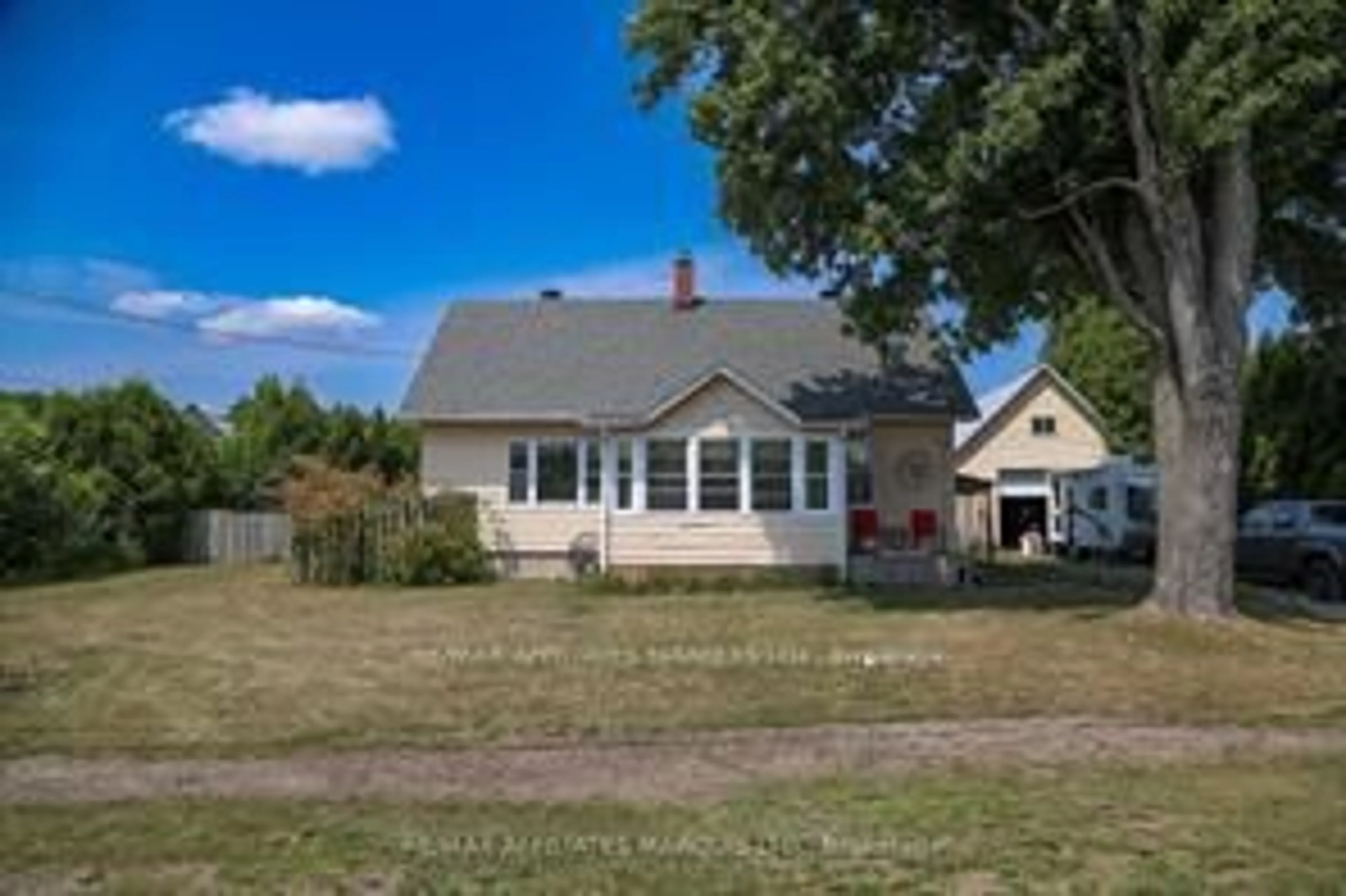 A pic from outside/outdoor area/front of a property/back of a property/a pic from drone, street for 13039 Riverside Dr, South Dundas Ontario K0C 1X0