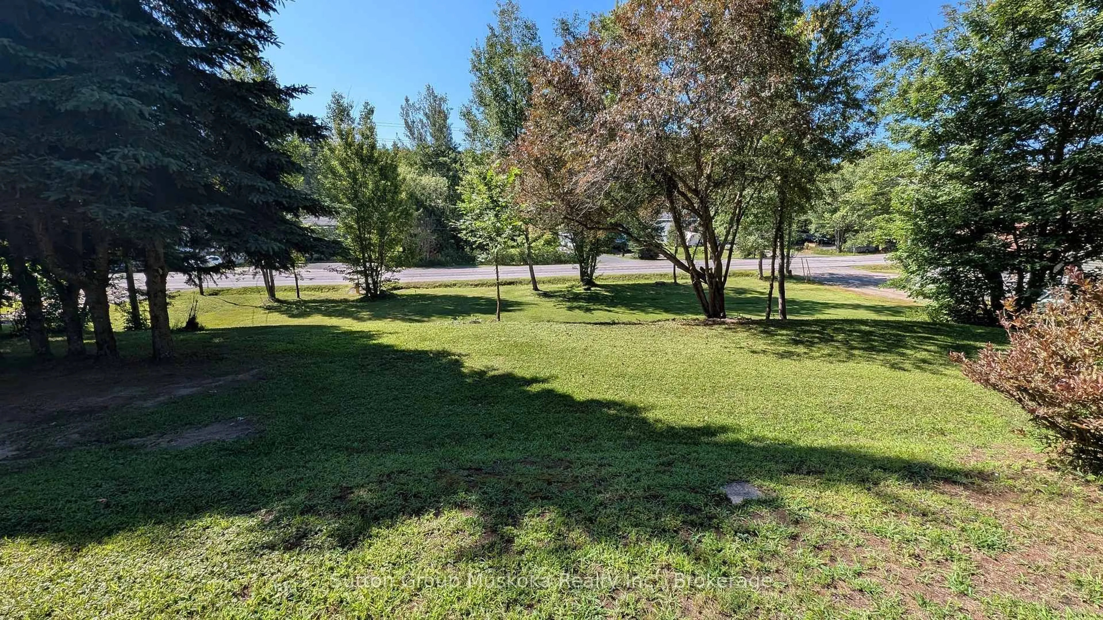 A pic from outside/outdoor area/front of a property/back of a property/a pic from drone, forest/trees view for 66 Hanes Rd, Huntsville Ontario P1H 1M3