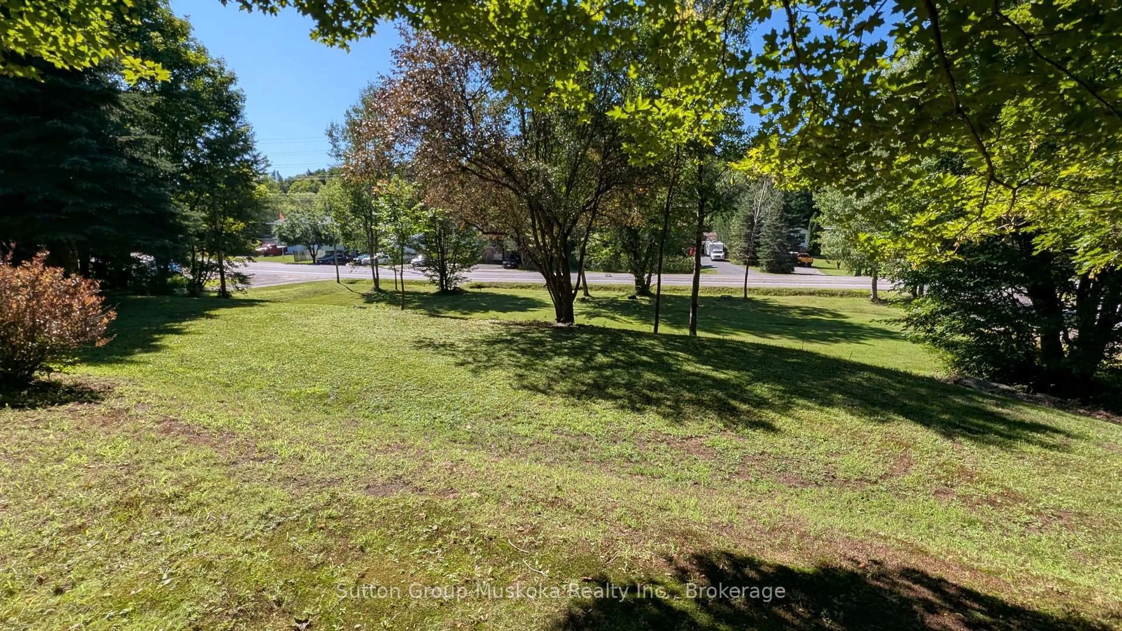 A pic from outside/outdoor area/front of a property/back of a property/a pic from drone, forest/trees view for 66 Hanes Rd, Huntsville Ontario P1H 1M3
