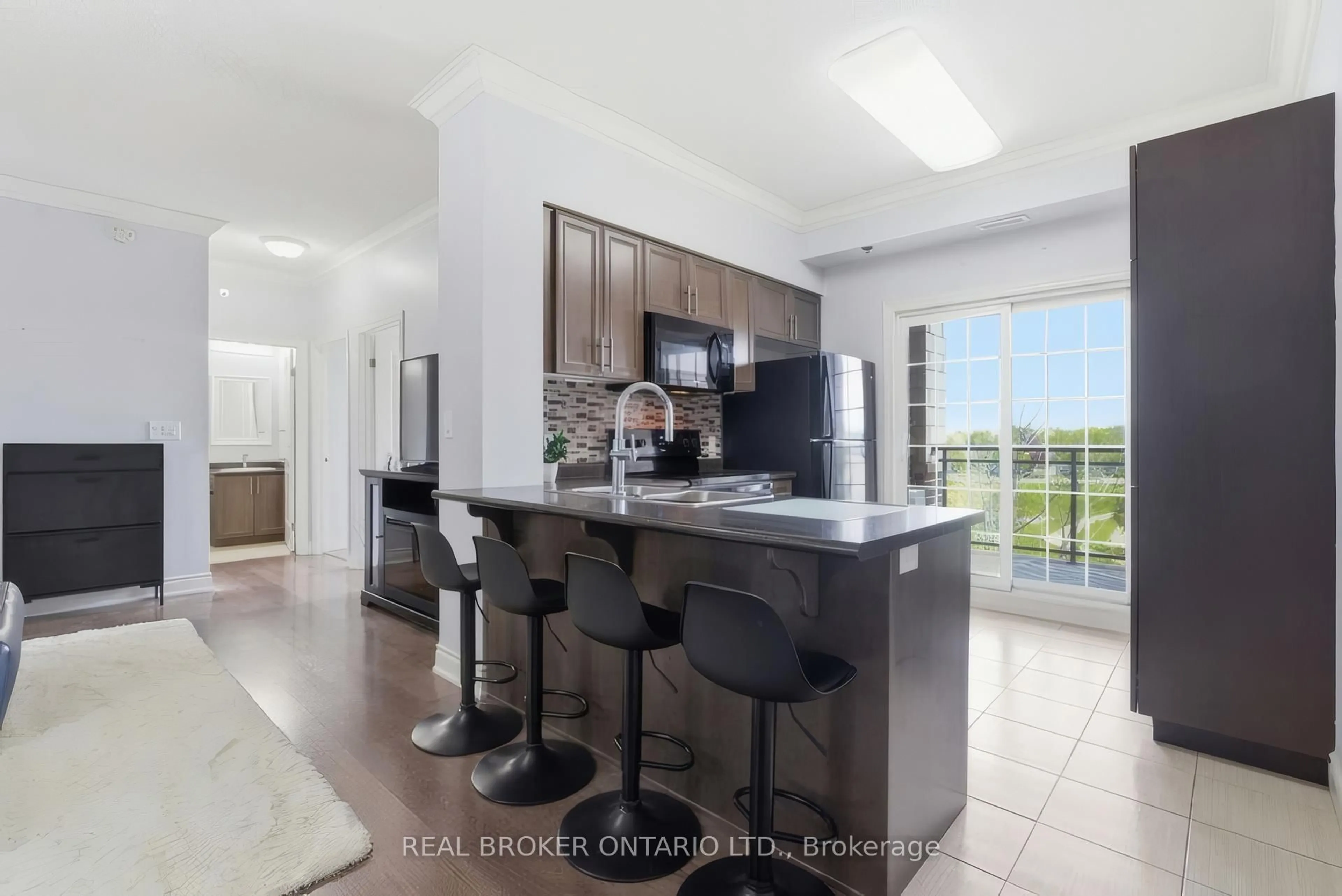 Open concept kitchen, ceramic/tile floor for 1440 Gordon St #414, Guelph Ontario N1L 1C8