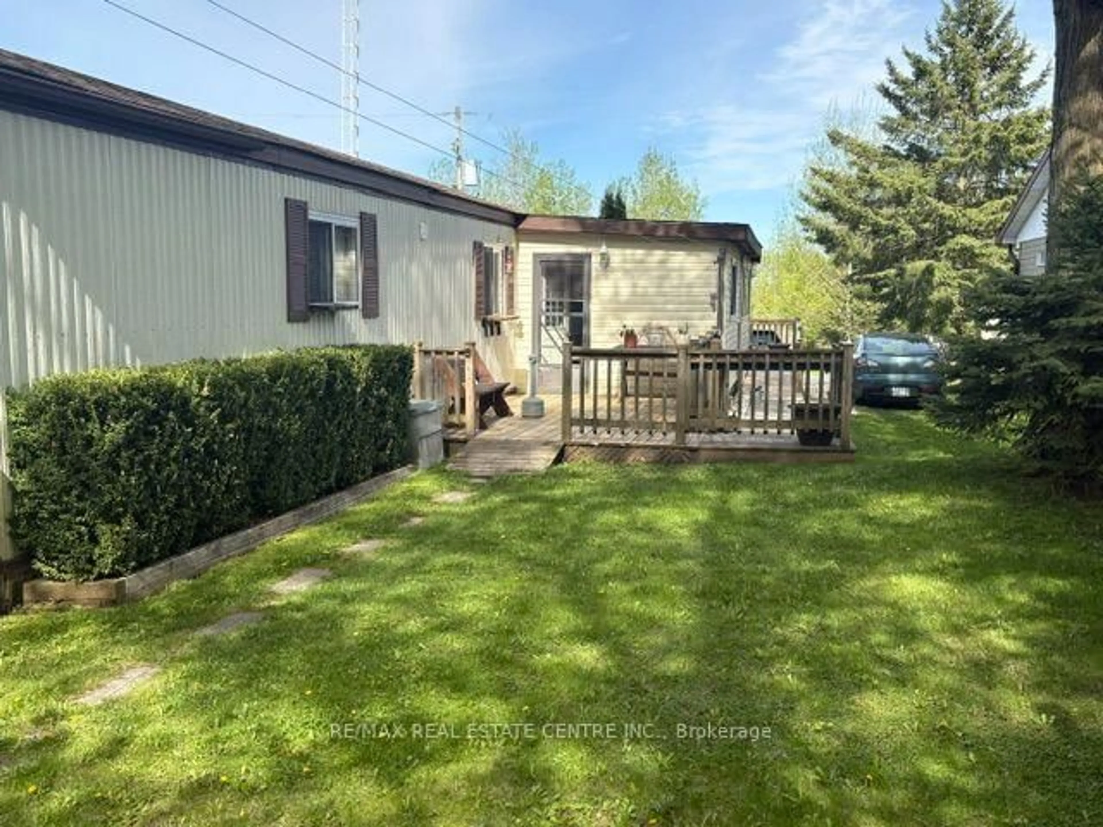 A pic from outside/outdoor area/front of a property/back of a property/a pic from drone, unknown for 21 Maple Grove Village Rd, Southgate Ontario N0C 1B0