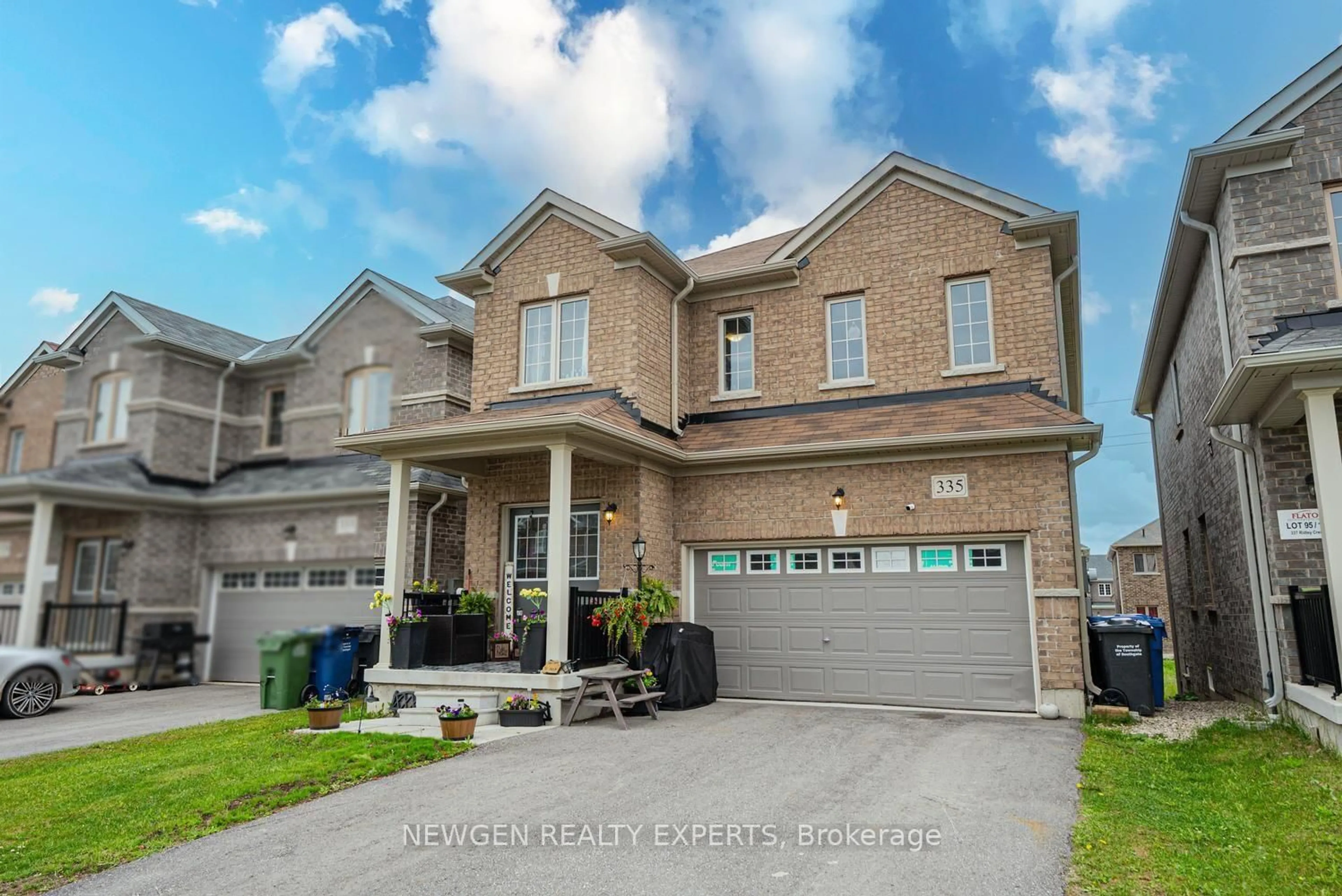 Home with brick exterior material, street for 335 Ridley Cres, Southgate Ontario N0C 1B0