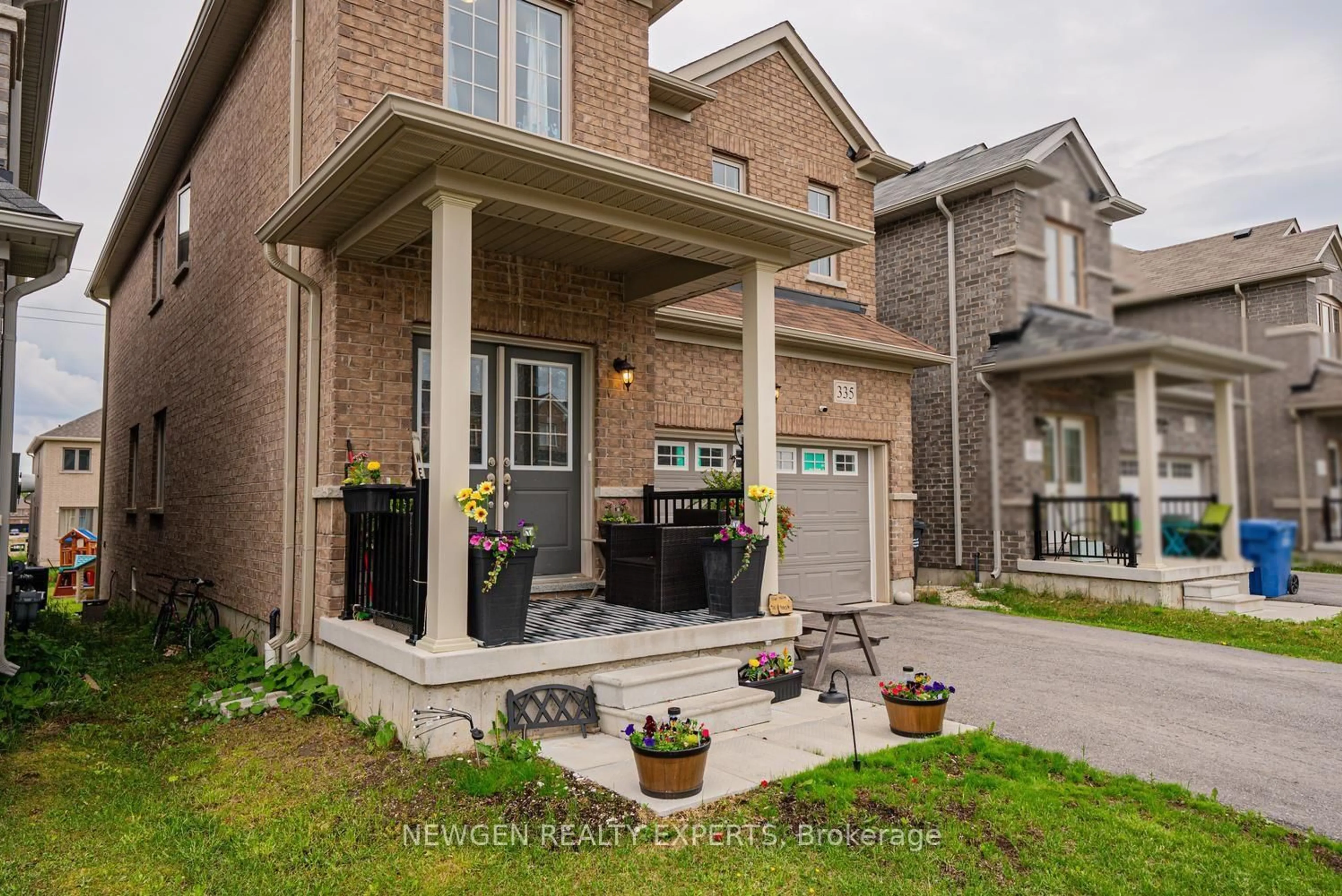 Home with brick exterior material, street for 335 Ridley Cres, Southgate Ontario N0C 1B0