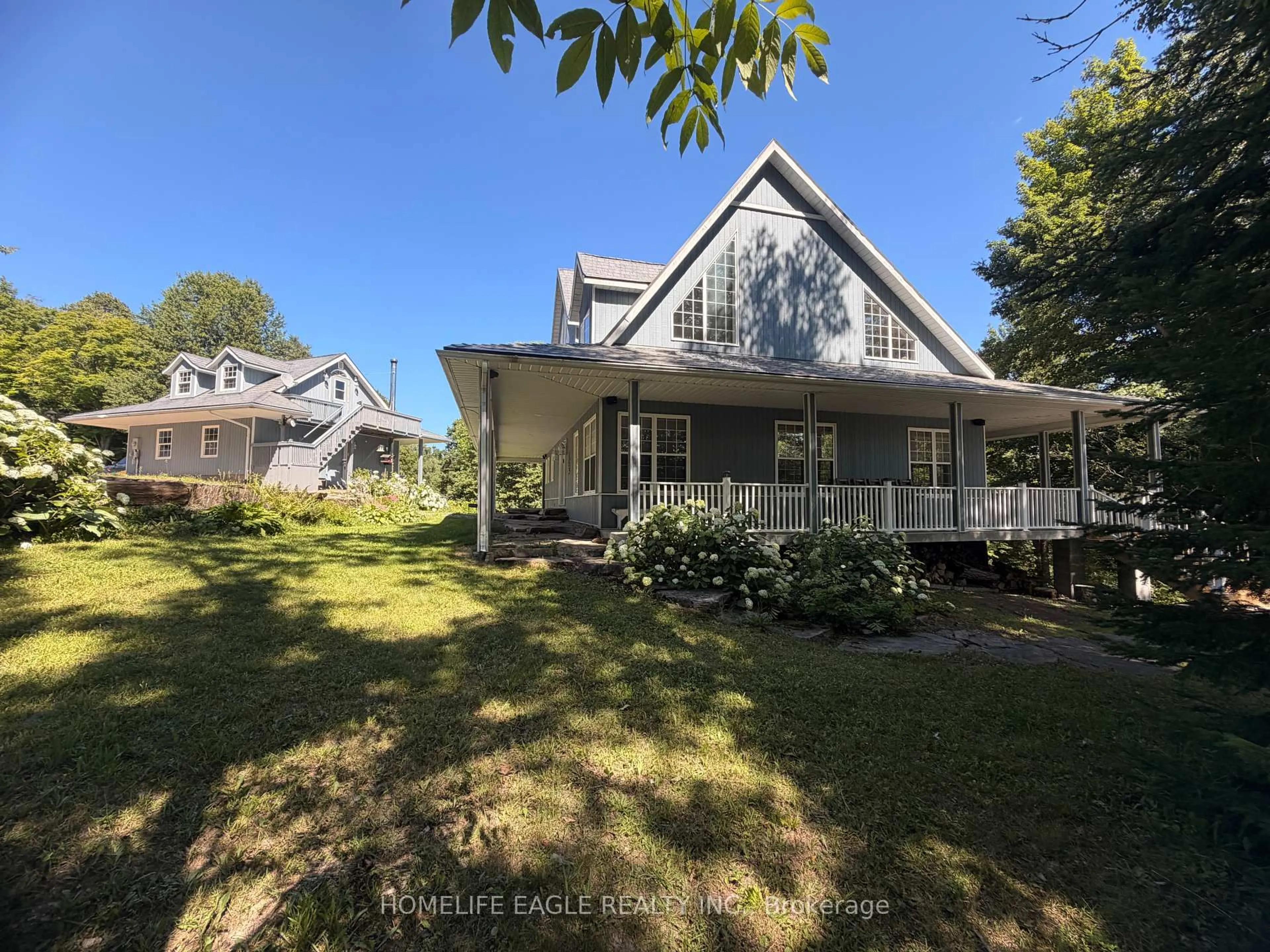 A pic from outside/outdoor area/front of a property/back of a property/a pic from drone, street for 3 Northshore Dr, Parry Sound Remote Area Ontario P0H 2R0