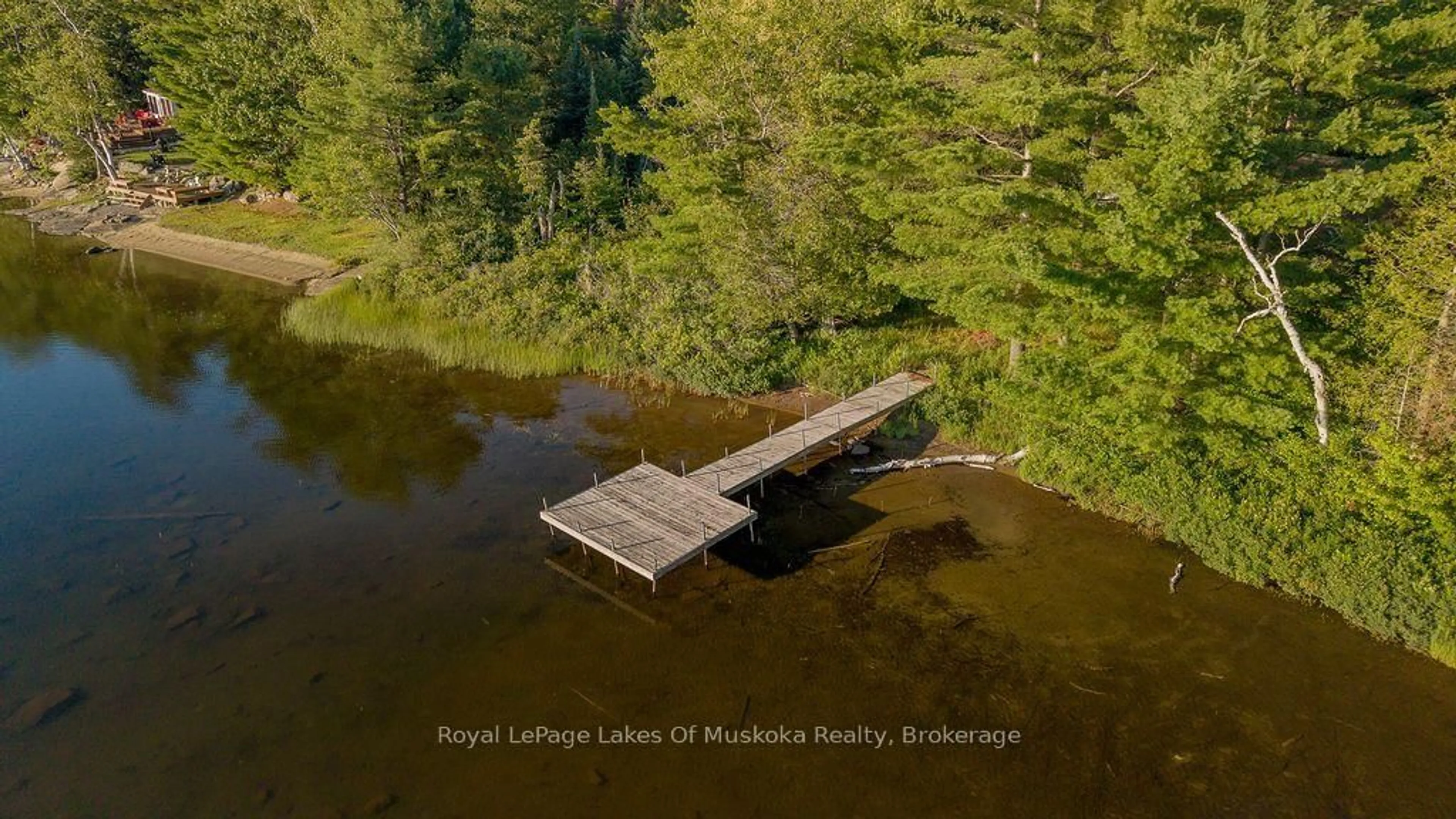 A pic from outside/outdoor area/front of a property/back of a property/a pic from drone, water/lake/river/ocean view for 3712 Brunel Rd, Lake of Bays Ontario P0B 1A0