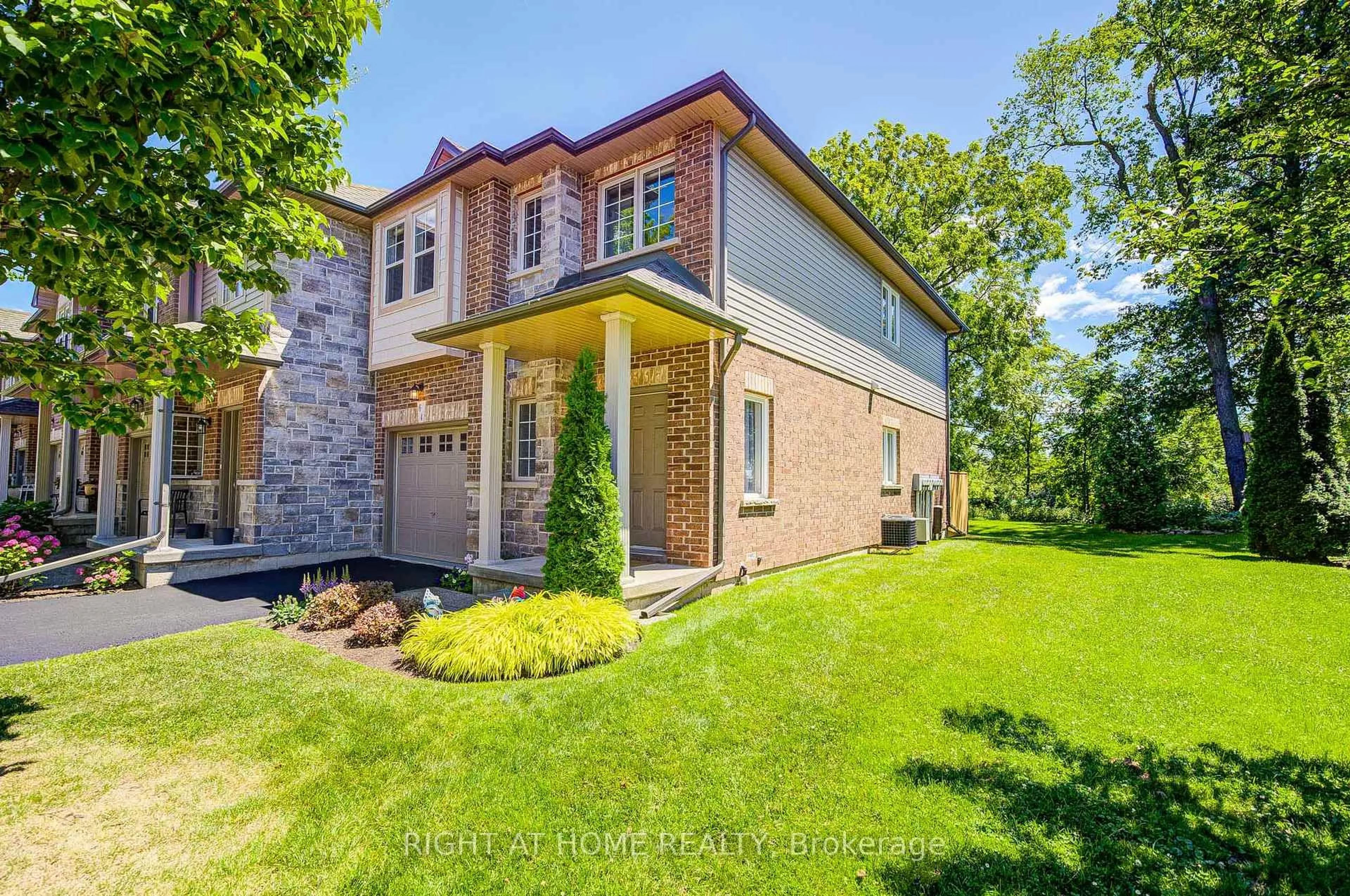 Home with brick exterior material, street for 64 Myers Lane #64, Hamilton Ontario L9G 0A5