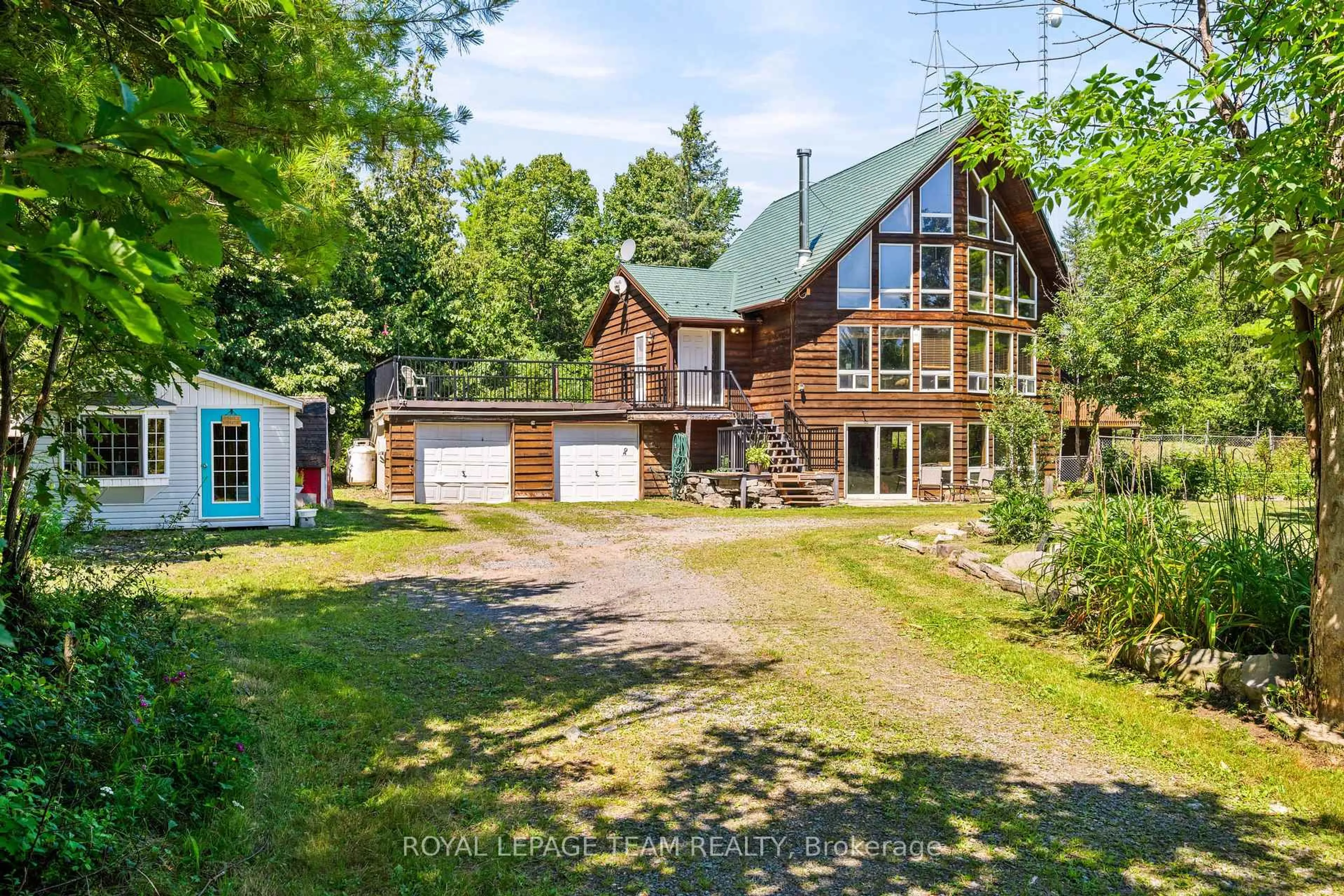 A pic from outside/outdoor area/front of a property/back of a property/a pic from drone, water/lake/river/ocean view for 4984 Dunrobin Rd, Ottawa Ontario K0A 3M0