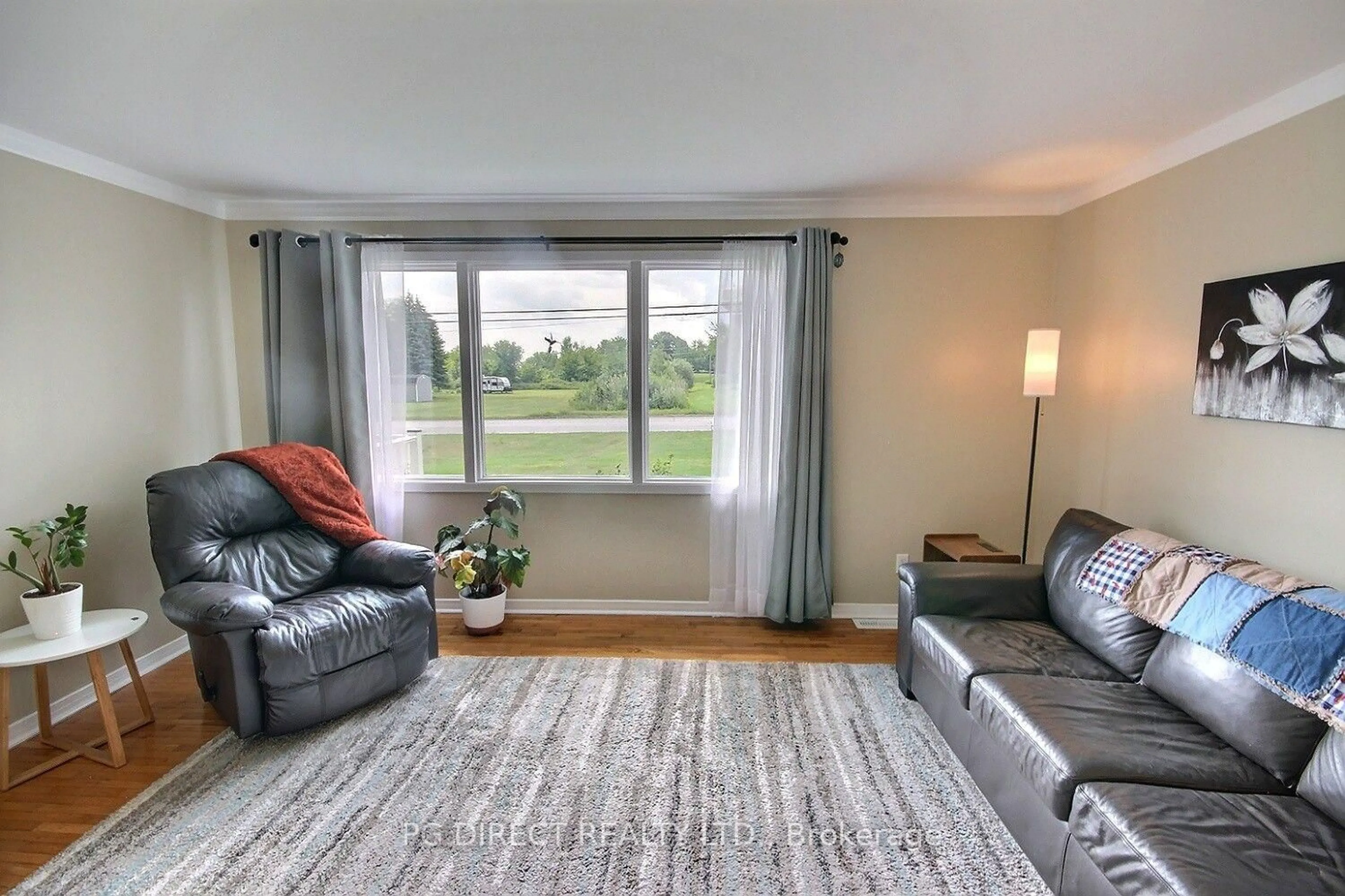 Living room with furniture, unknown for 2402 Hamilton Rd, Trenton Ontario K8V 5P8