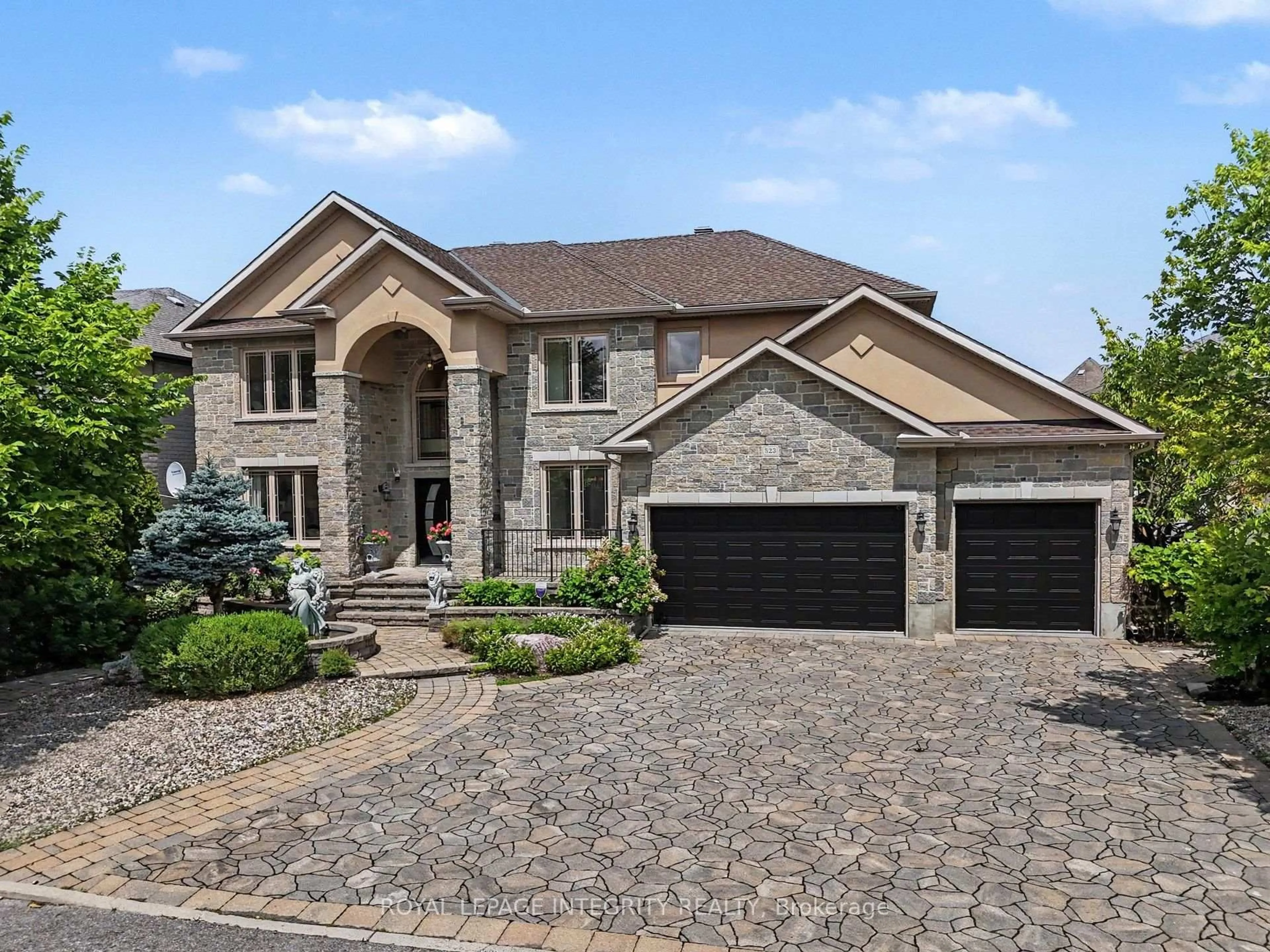 Home with brick exterior material, street for 523 Kochar Dr, Ottawa Ontario K2C 4G9