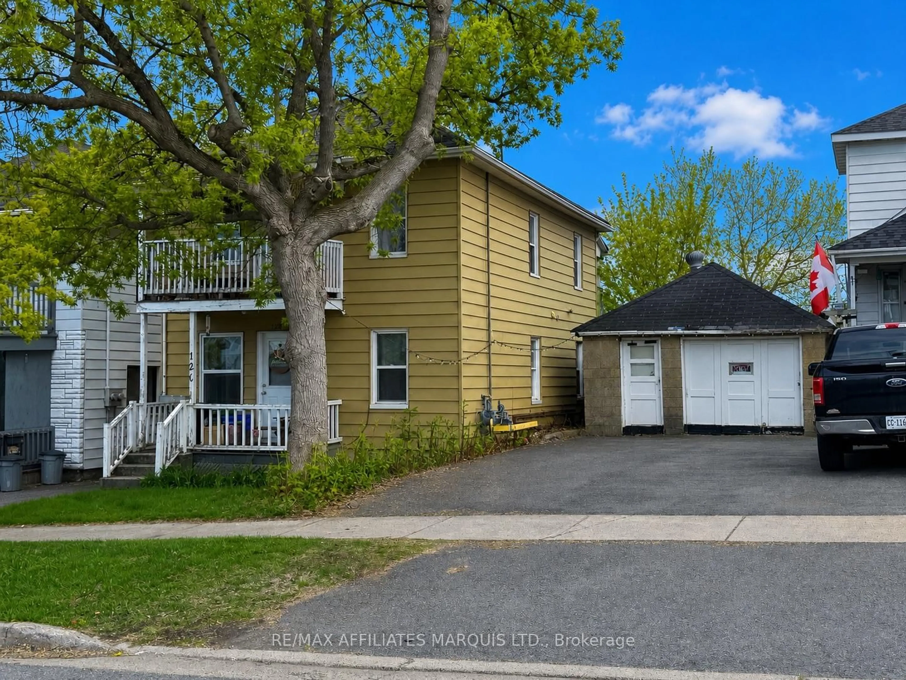 A pic from outside/outdoor area/front of a property/back of a property/a pic from drone, street for 120-120A Guy St, Cornwall Ontario K6H 4T8